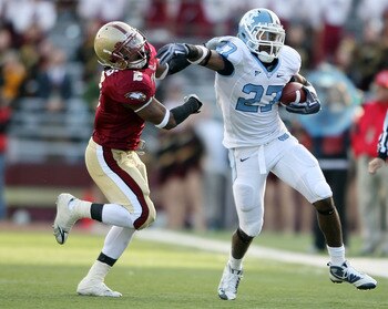 CHESTNUT HILL, MA - NOVEMBER 21:  Deunta Williams #27 of the North Carolina Tar Heels carries the ball as Montel Harris #2 of the Boston College Eagles tries to make the stop on November 21, 2009 at Alumni Stadium in Chestnut Hill, Massachusetts. The Tar