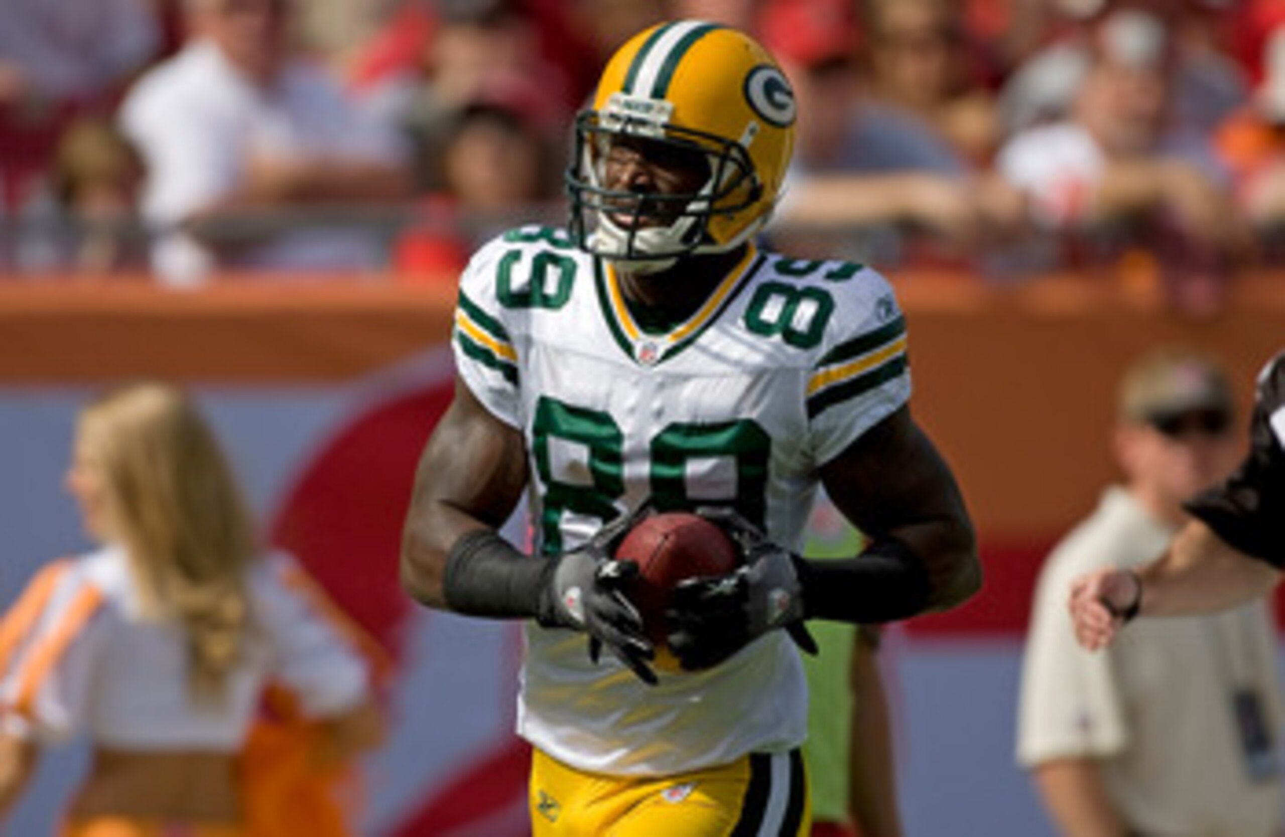 TAMPA, FL - NOVEMBER 08:  Receiver James Jones #89 of the Green Bay Packers  scores a first quarter touchdown against the Tampa Bay Buccaneers during the game at Raymond James Stadium on November 8, 2009 in Tampa, Florida.  (Photo by J. Meric/Getty Images