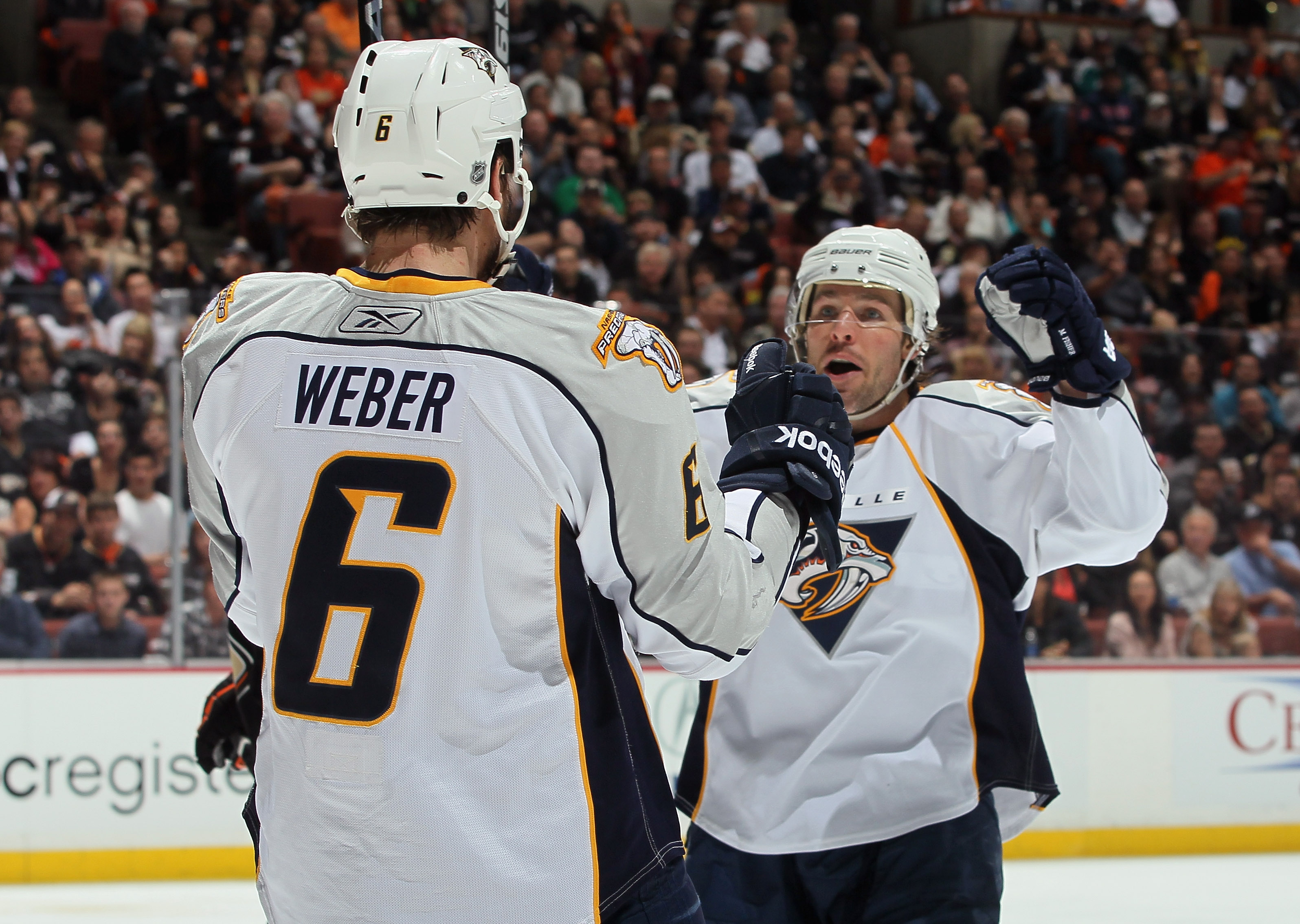ANAHEIM, CA - APRIL 15:  Mike Fisher #12 of the Nashville Predators celebrates a goal by Shea Weber #6 against the Anaheim Ducks in the second period of Game Two of the Western Conference Quarterfinals during the 2011 NHL Stanley Cup Playoffs at Honda Cen