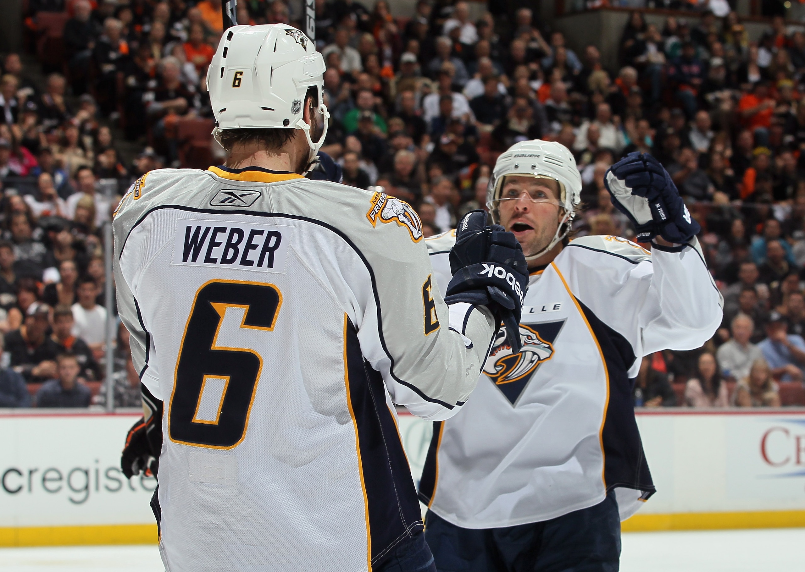ANAHEIM, CA - APRIL 15:  Mike Fisher #12 of the Nashville Predators celebrates a goal by Shea Weber #6 against the Anaheim Ducks in the second period of Game Two of the Western Conference Quarterfinals during the 2011 NHL Stanley Cup Playoffs at Honda Cen