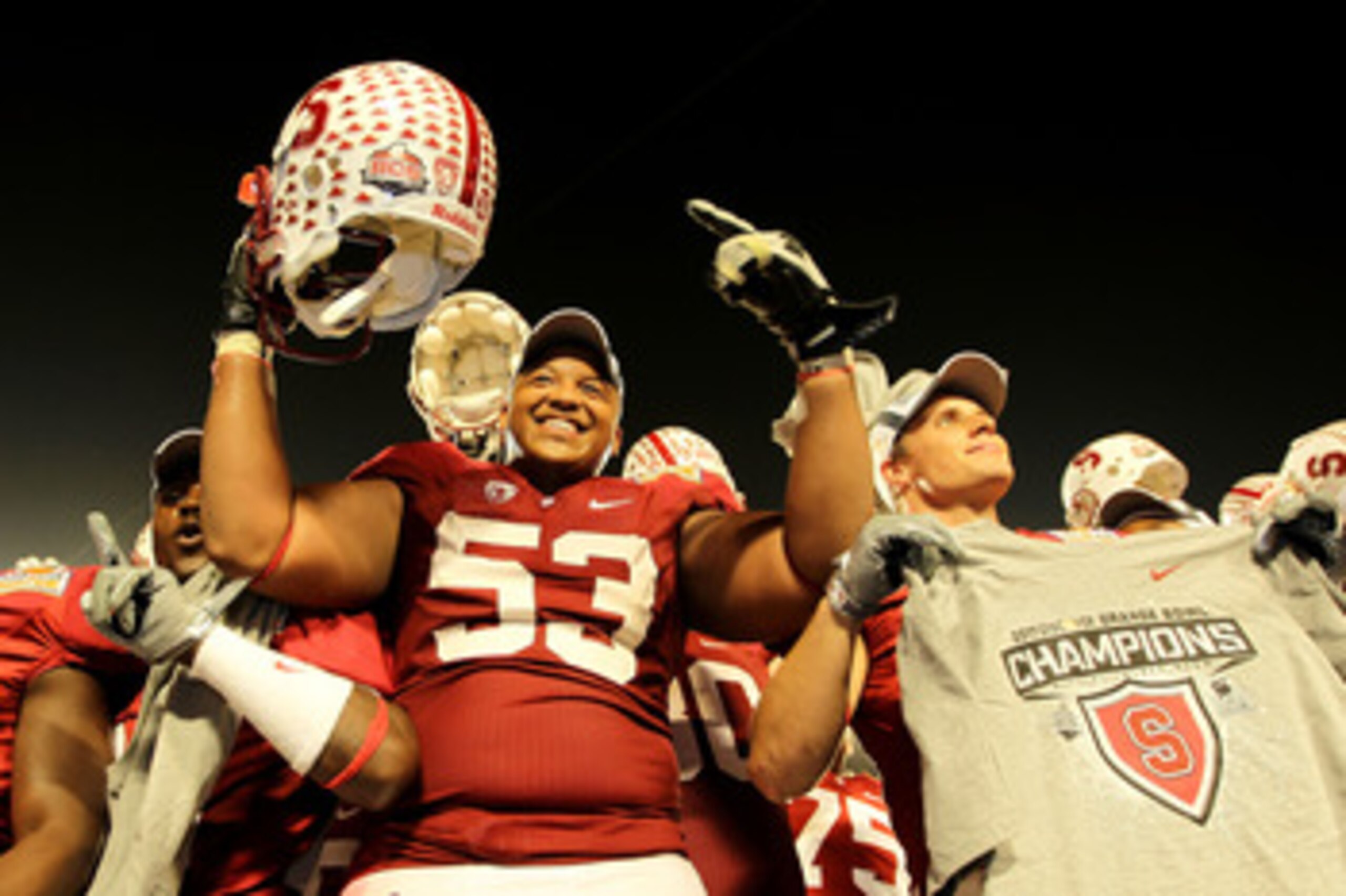 MIAMI, FL - JANUARY 03: Derek Hall #53 of the Stanford Cardinal celebrates with teammates after Stanford won 40-12 against the Virginia Tech Hokies during the 2011 Discover Orange Bowl at Sun Life Stadium on January 3, 2011 in Miami, Florida. (Photo by Mi