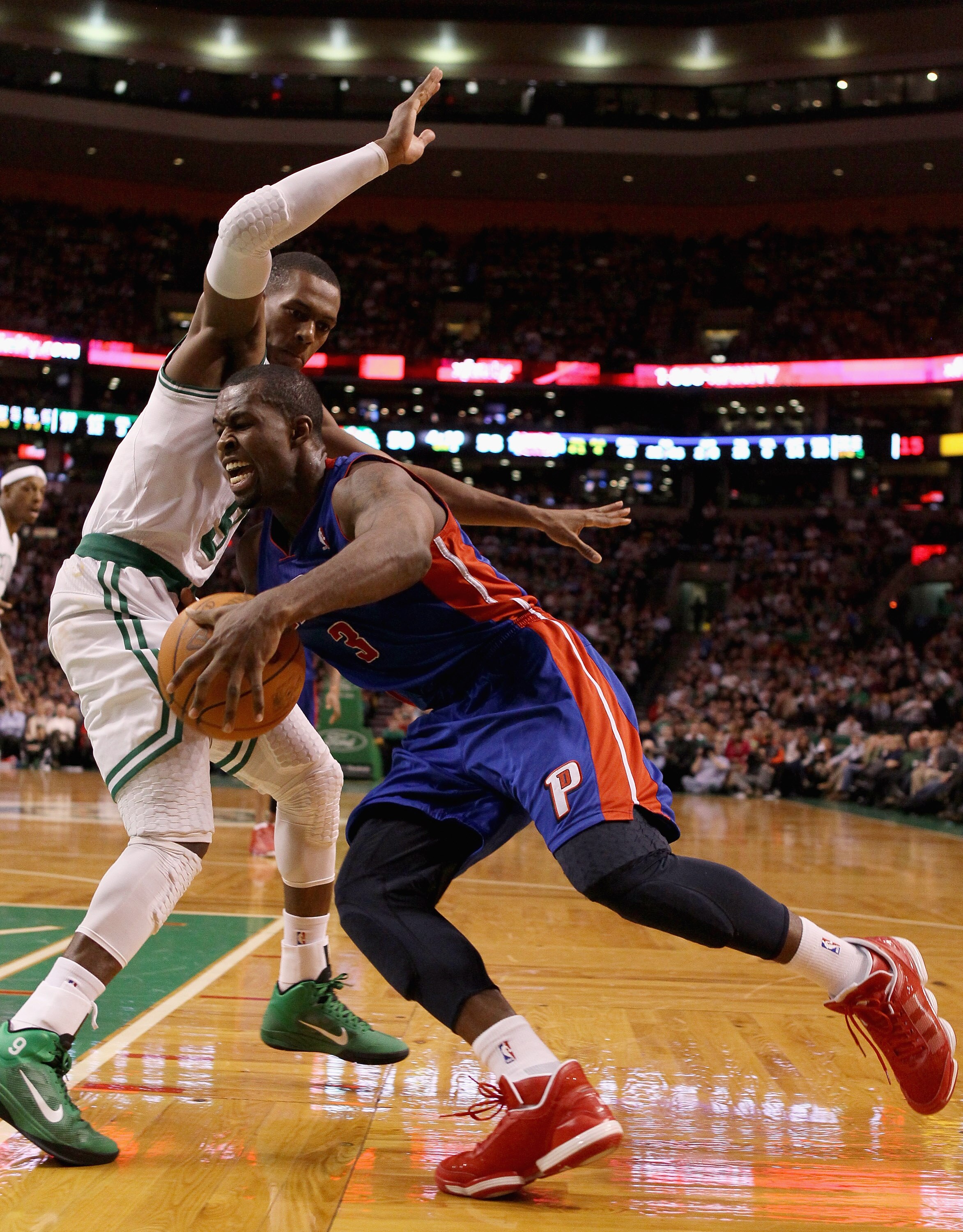 BOSTON, MA - JANUARY 19:  Rodney Stuckey #3 of the Detroit Pistons drives around Rajon Rondo #9 of the Boston Celtics on January 19, 2011 at the TD Garden in Boston, Massachusetts. The Celtics defeated the Pistons 86-82. NOTE TO USER: User expressly ackno