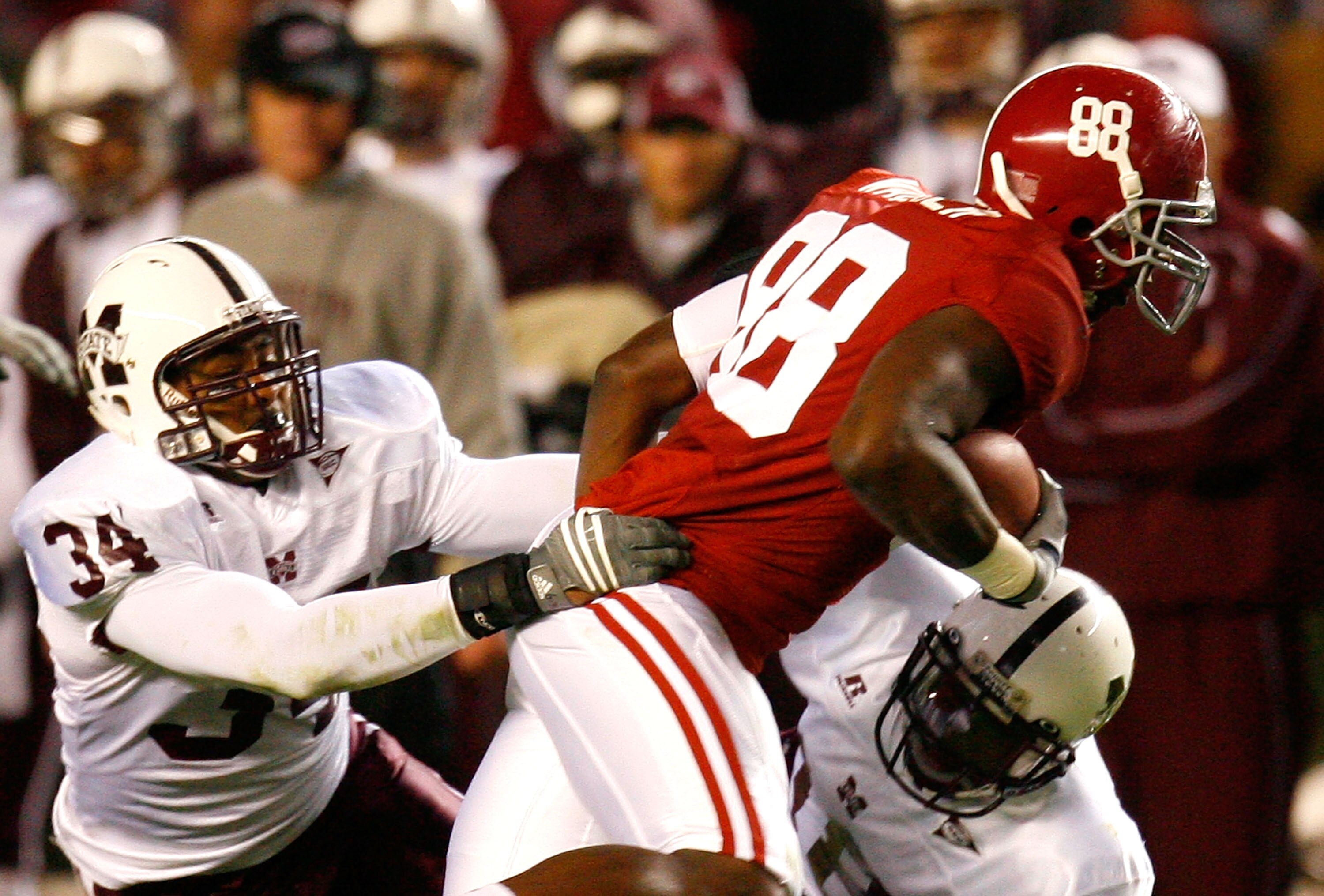 TUSCALOOSA, AL - NOVEMBER 15:  Tight end Nick Walker #88 of the Alabama Crimson Tide breaks a tackle by K.J. Wright #34 and Marcus Washington #18 of the Mississippi State Bulldogs during the game at Bryant-Denny Stadium on November 15, 2008 in Tuscaloosa,