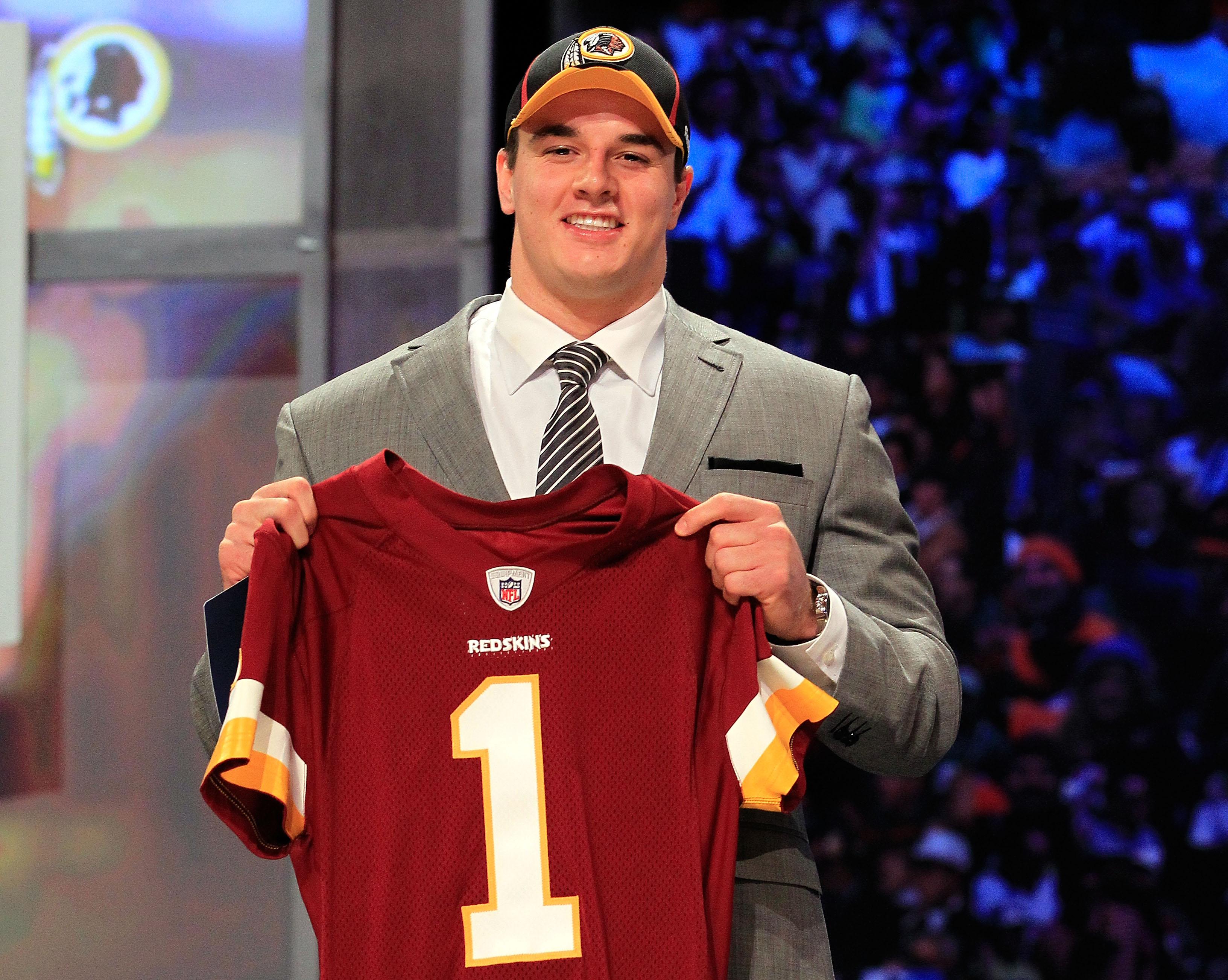 NEW YORK, NY - APRIL 28:  Ryan Kerrigan, #16 overall pick by the Washington Redskins, holds up a jersey on stage during the 2011 NFL Draft at Radio City Music Hall on April 28, 2011 in New York City.  (Photo by Chris Trotman/Getty Images)