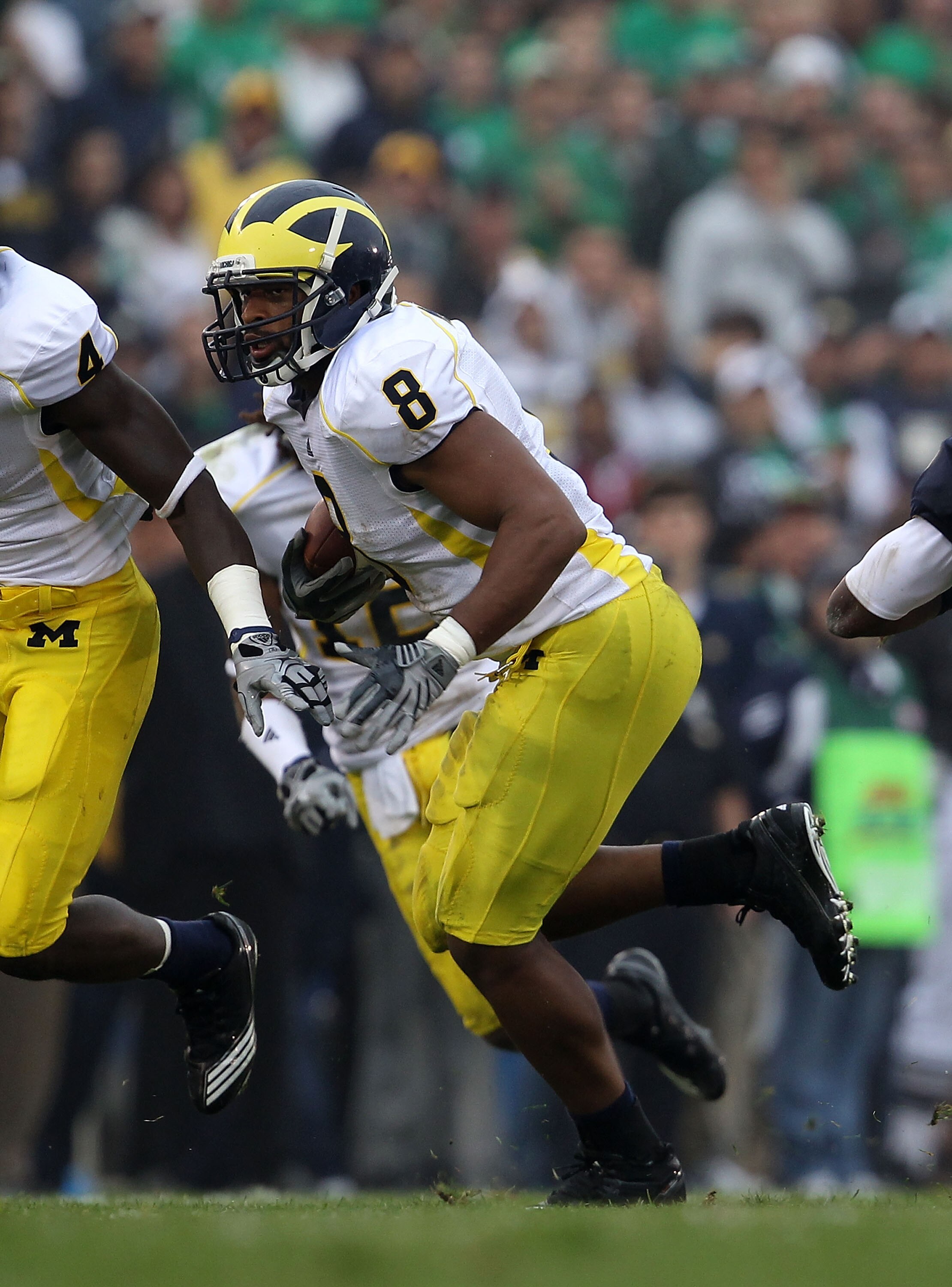 SOUTH BEND, IN - SEPTEMBER 11: Jonas Mouton #8 of the Michigan Wolverines runs after intercepting a pass against the Notre Dame Fighting Irish at Notre Dame Stadium on September 11, 2010 in South Bend, Indiana. (Photo by Jonathan Daniel/Getty Images)