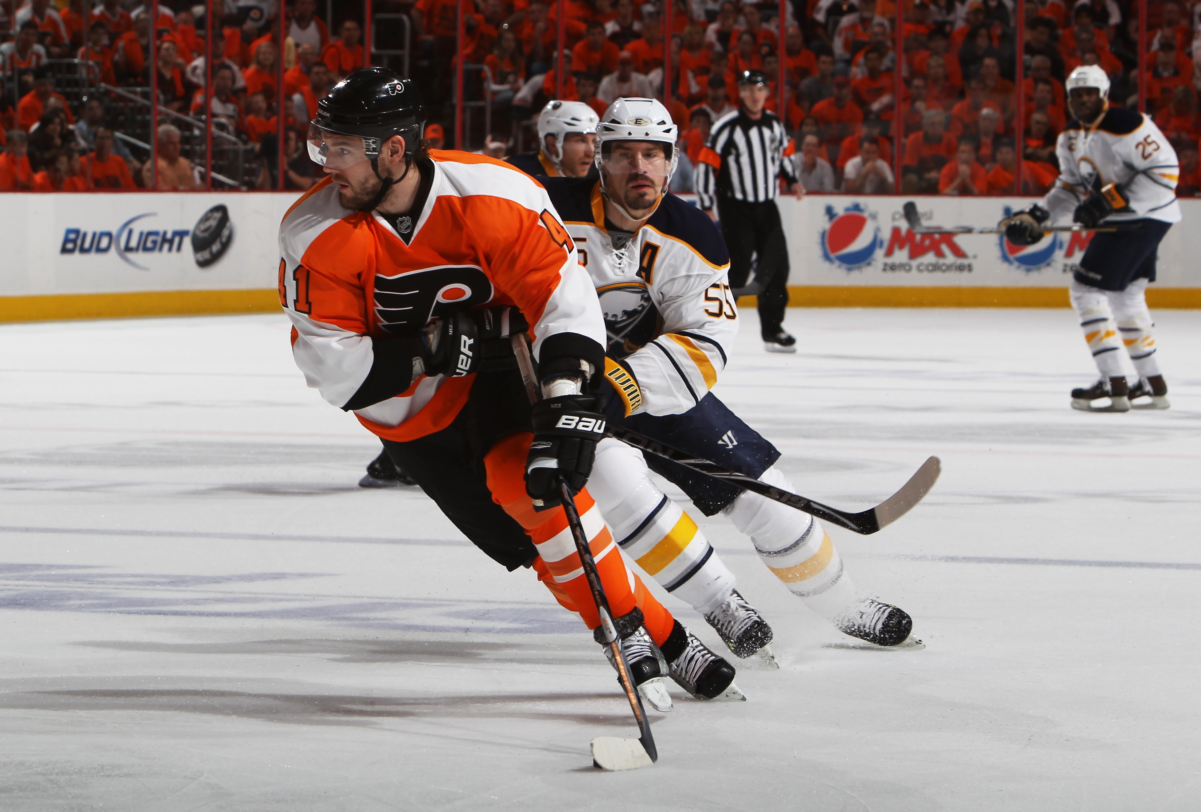 PHILADELPHIA, PA - APRIL 26:  Andrej Meszaros #41 of the Philadelphia Flyers controls the puck against Jochen Hecht #55 of the Buffalo Sabres in Game Seven of the Eastern Conference Quarterfinals during the 2011 NHL Stanley Cup Playoffs at Wells Fargo Cen