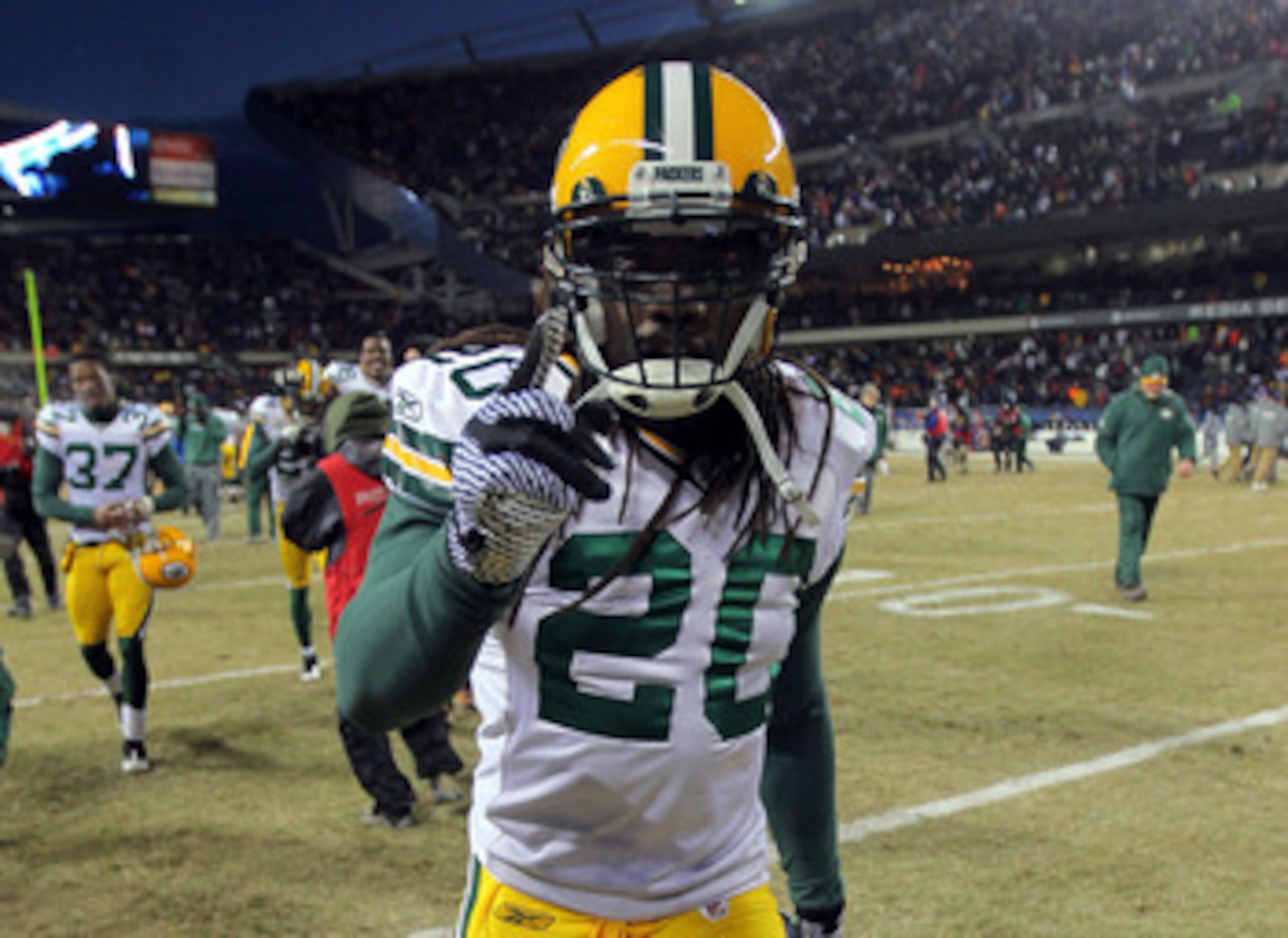 CHICAGO, IL - JANUARY 23:  Atari Bigby #20 of the Green Bay Packers celebrates after the Packers 21-14 victory against the Chicago Bears in the NFC Championship Game at Soldier Field on January 23, 2011 in Chicago, Illinois.  (Photo by Doug Pensinger/Gett