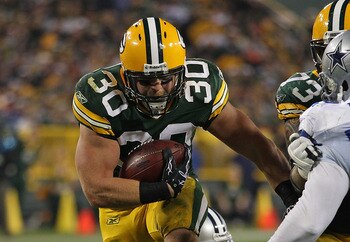 GREEN BAY, WI - NOVEMBER 07: John Kuhn #30 of the Green Bay Packers runs against the Dallas Cowboys at Lambeau Field on November 7, 2010 in Green Bay, Wisconsin. (Photo by Jonathan Daniel/Getty Images)