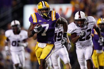 BATON ROUGE, LA - NOVEMBER 13: Patrick Peterson #7 of the Louisiana State University Tigers runs back an interception against the Louisiana Monroe Warhawks at Tiger Stadium on November 13, 2010 in Baton Rouge, Louisiana. (Photo by Chris Graythen/Getty I BATON ROUGE, LA - NOVEMBER 13: Patrick Peterson #7 of the Louisiana State University Tigers runs back an interception against the Louisiana Monroe Warhawks at Tiger Stadium on November 13, 2010 in Baton Rouge, Louisiana. (Photo by Chris Graythen/Getty I