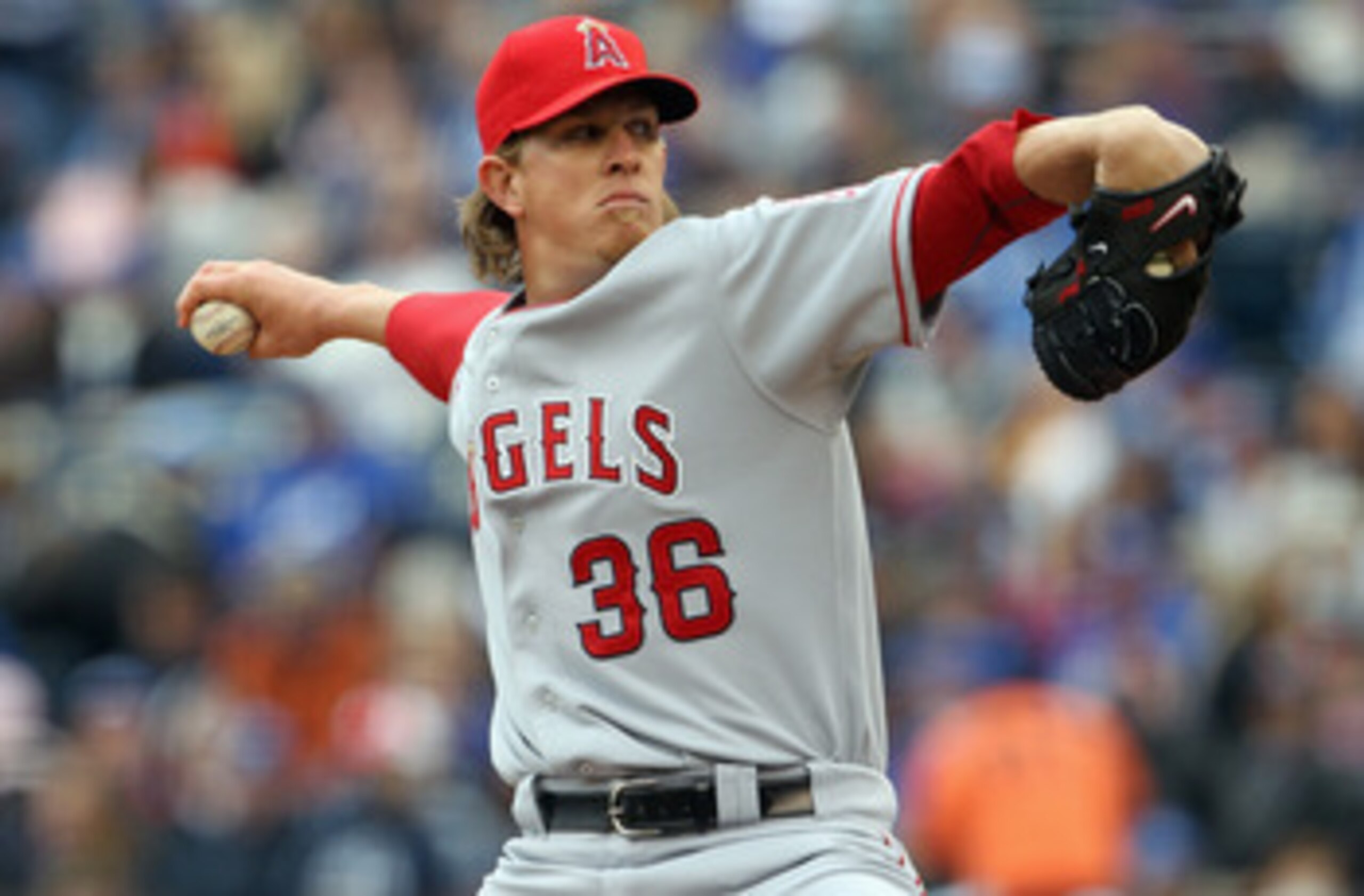 KANSAS CITY, MO - MARCH 31:  Starting pitcher Jered Weaver #36 of the Los Angeles Angels of Anaheim delivers his first pitch during the 1st inning of the opening day game against the Kansas City Royals at Kauffman Stadium on March 31, 2011 in Kansas City,