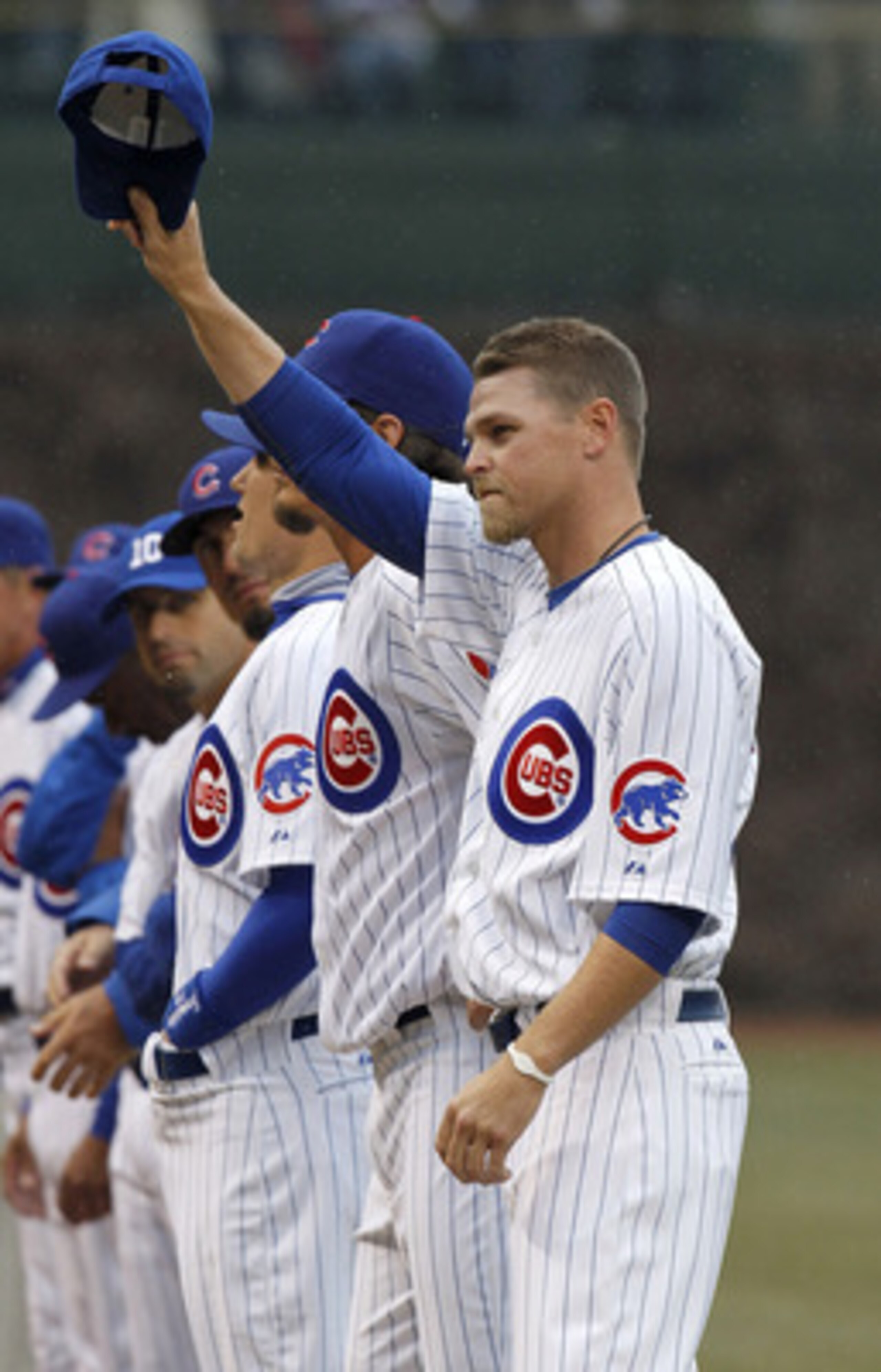 CHICAGO, IL - APRIL 01: Kerry Wood #34 of the Chicago Cubs tips his hat to fans during player introductions prior to playing the Pittsburgh Pirates on opening day at Wrigley Field on April 1, 2011 in Chicago, Illinois. Pittsburgh won the game 6-3. (Photo CHICAGO, IL - APRIL 01: Kerry Wood #34 of the Chicago Cubs tips his hat to fans during player introductions prior to playing the Pittsburgh Pirates on opening day at Wrigley Field on April 1, 2011 in Chicago, Illinois. Pittsburgh won the game 6-3. (Photo