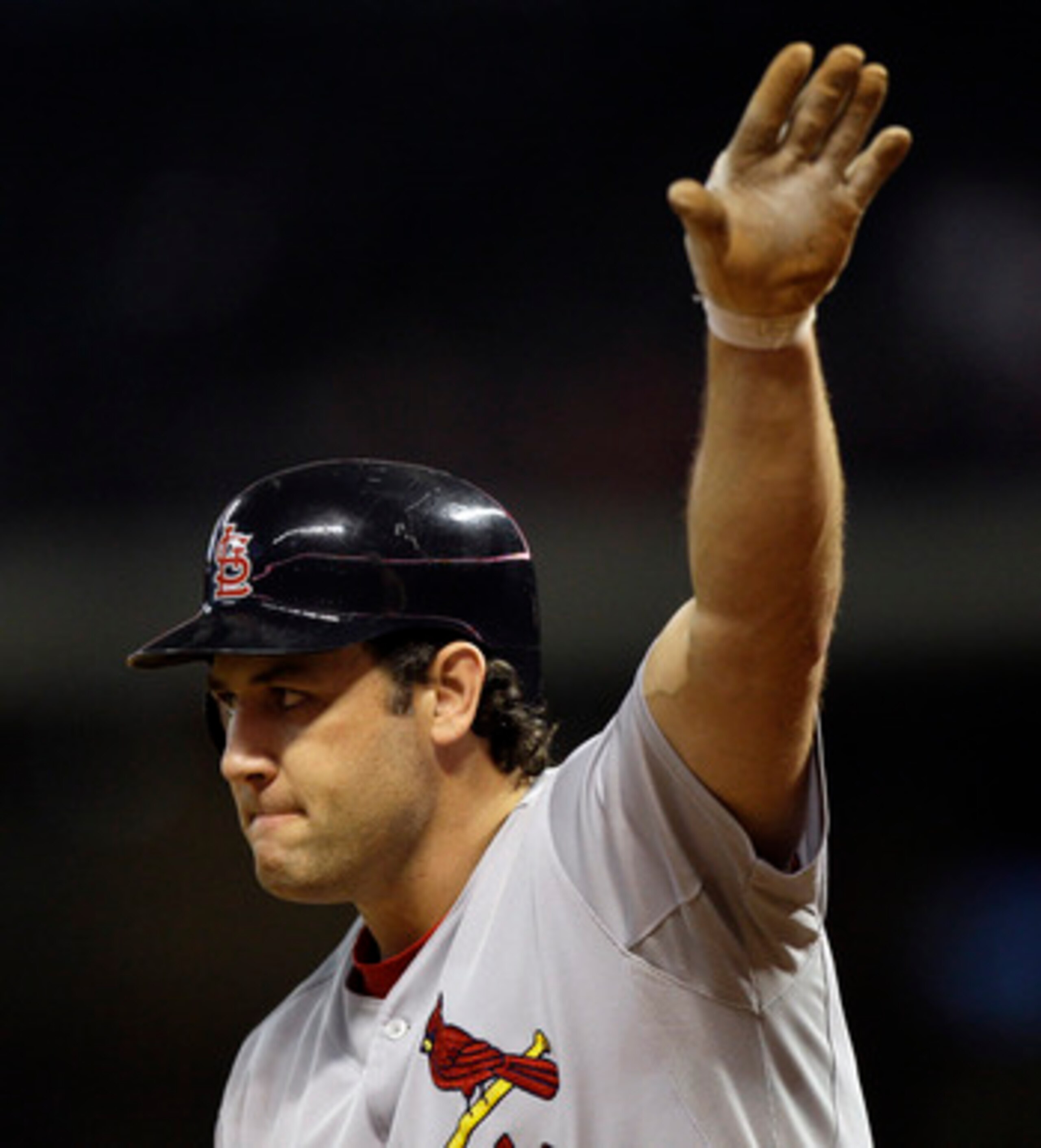 HOUSTON - APRIL 26:  First baseman Lance Berkman #12 of the St.Louis Cardinals acknowledges the crowd at Minute Maid Park on April 26, 2011 in Houston, Texas.  (Photo by Bob Levey/Getty Images)