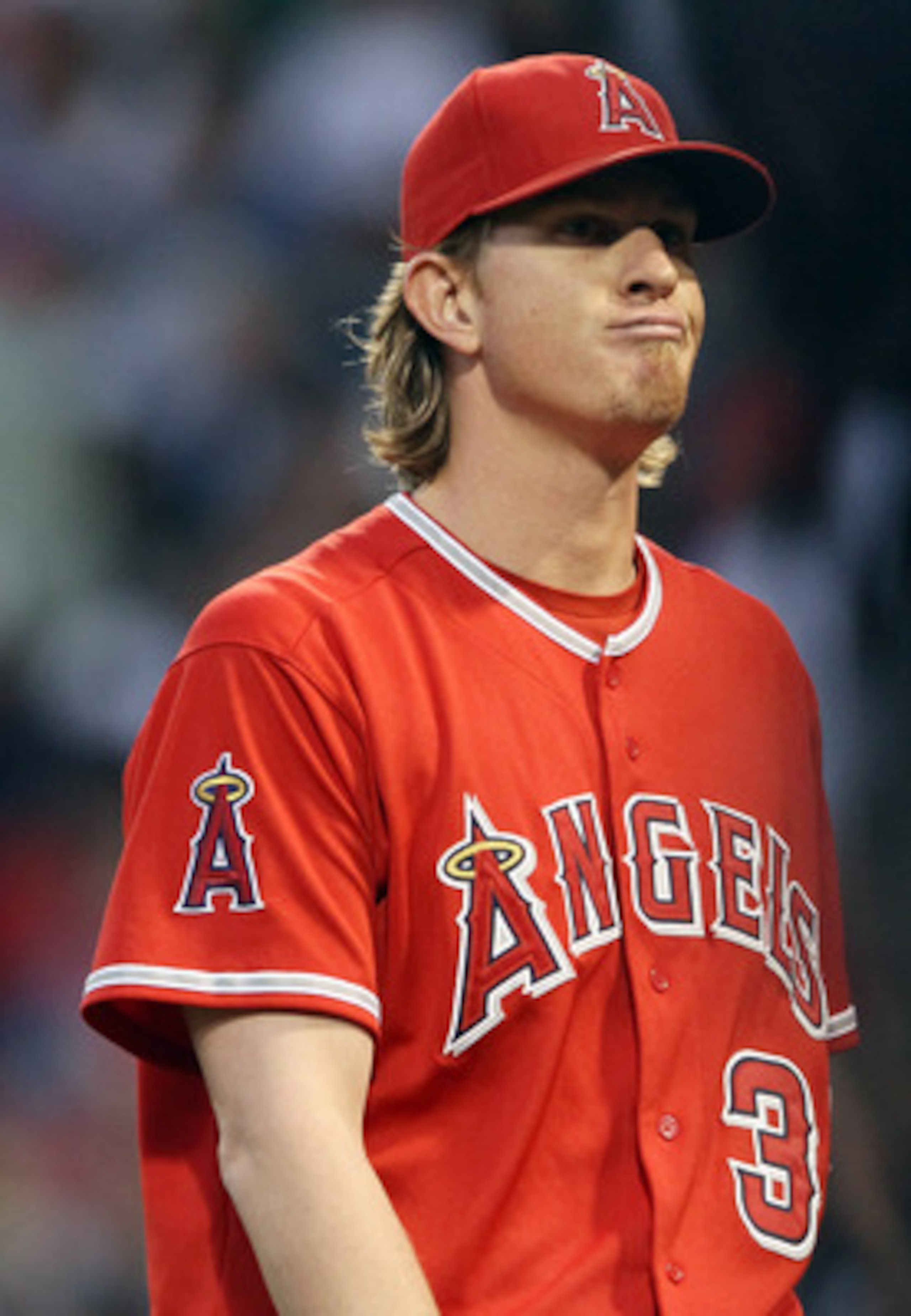 BOSTON, MA - MAY 02:  Jered Weaver #36 of the Los Angeles Angels heads back to the dugout after the first inning against the Boston Red Sox on May 2, 2011 at Fenway Park in Boston, Massachusetts.  (Photo by Elsa/Getty Images)