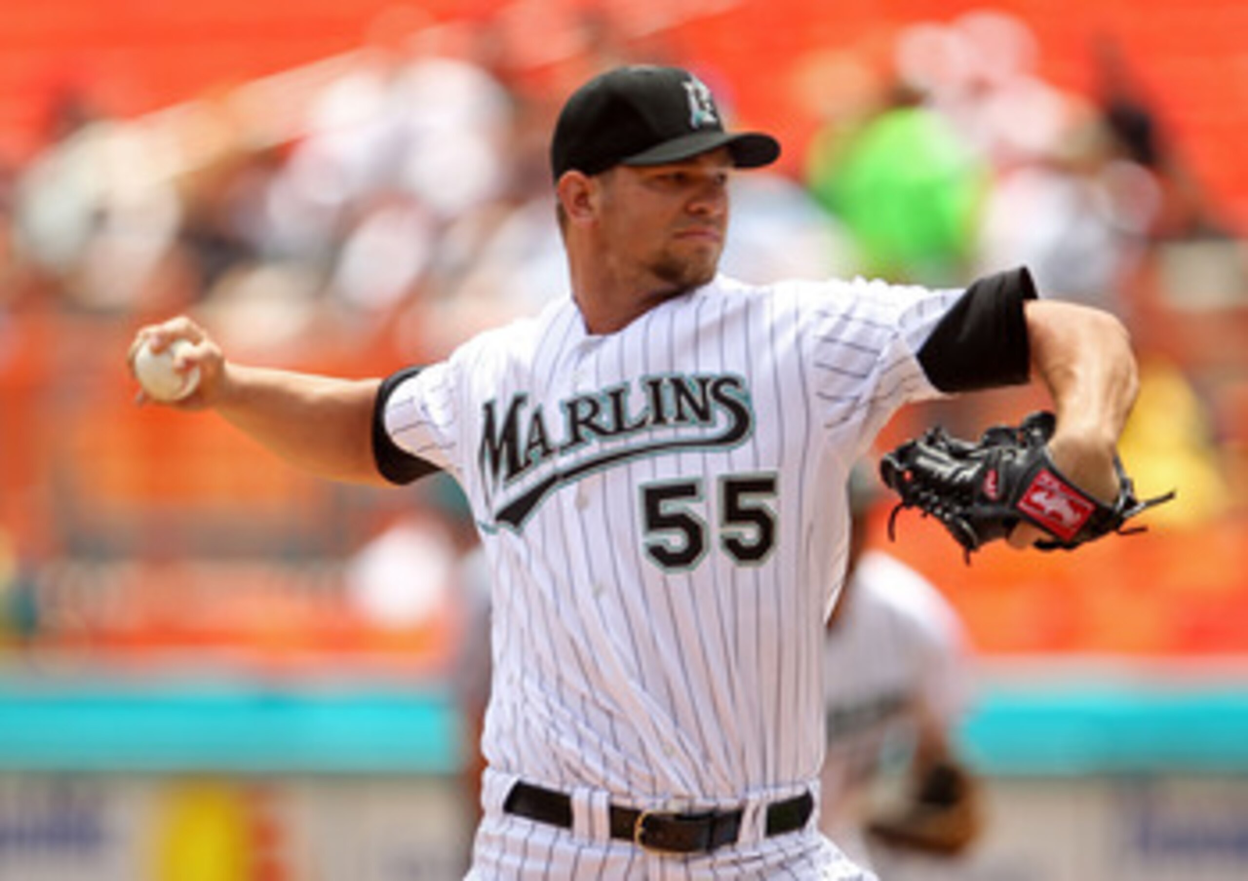 MIAMI GARDENS, FL - APRIL 24:  Josh Johnson #55 of the Florida Marlins pitches during a game against the Colorado Rockies at Sun Life Stadium on April 24, 2011 in Miami Gardens, Florida.  (Photo by Mike Ehrmann/Getty Images)
