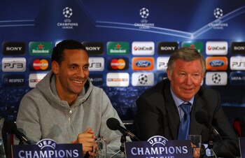 MANCHESTER, ENGLAND - APRIL 11:  Sir Alex Ferguson the manager of Manchester United and Rio Ferdinand face the media during a press conference ahead of their UEFA Champions League quarter final second leg match against Chelsea at the Old Trafford on April