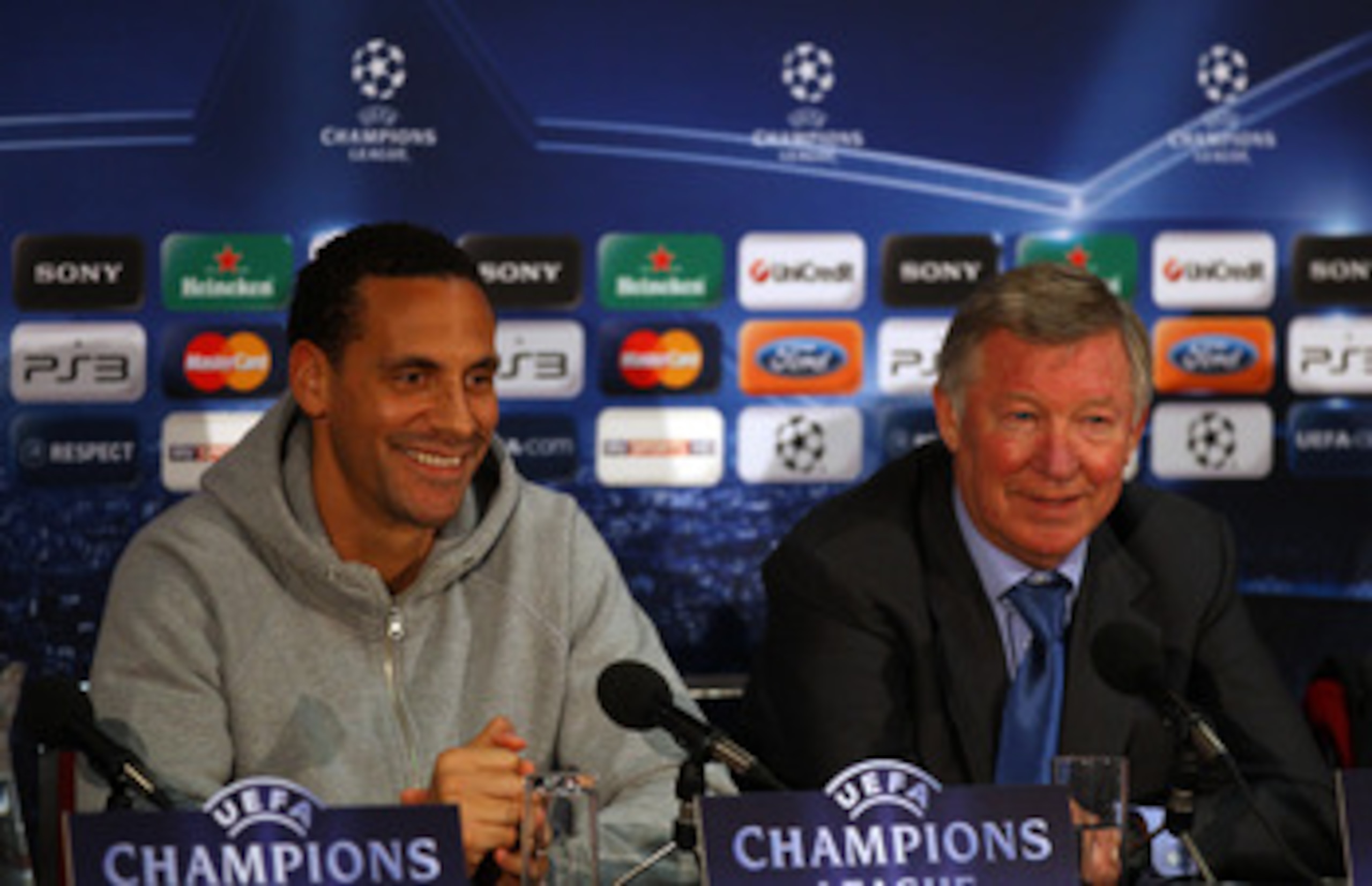 MANCHESTER, ENGLAND - APRIL 11:  Sir Alex Ferguson the manager of Manchester United and Rio Ferdinand face the media during a press conference ahead of their UEFA Champions League quarter final second leg match against Chelsea at the Old Trafford on April