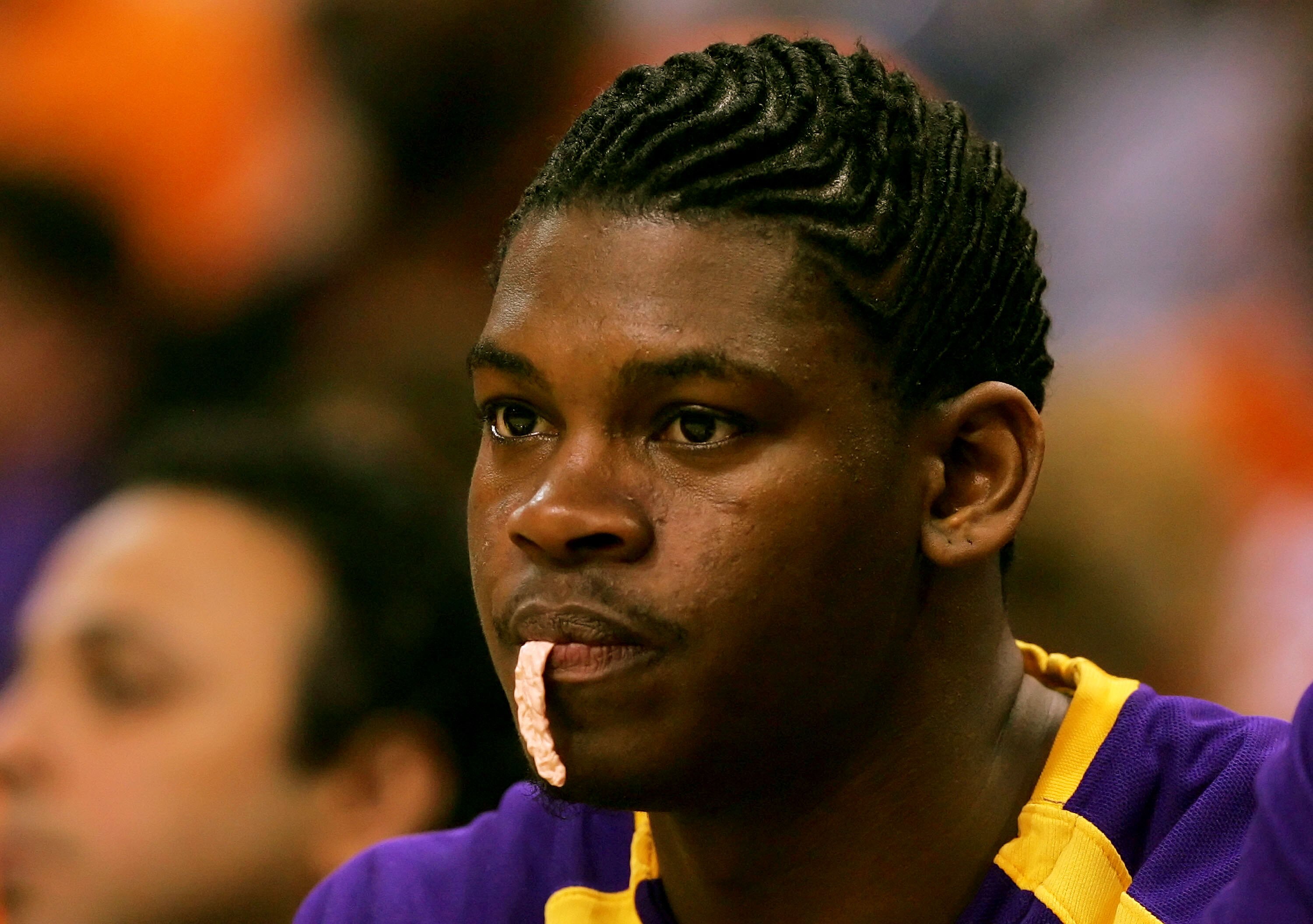 PHOENIX - APRIL 24:   Smush Parker #1 of the Los Angeles Lakers looks on from the bench in the fourth quarter against the Phoenix Suns in Game Two of the Western Conference Quarterfinals during the 2007 NBA Playoffs at US Airways Center on April 24, 2007
