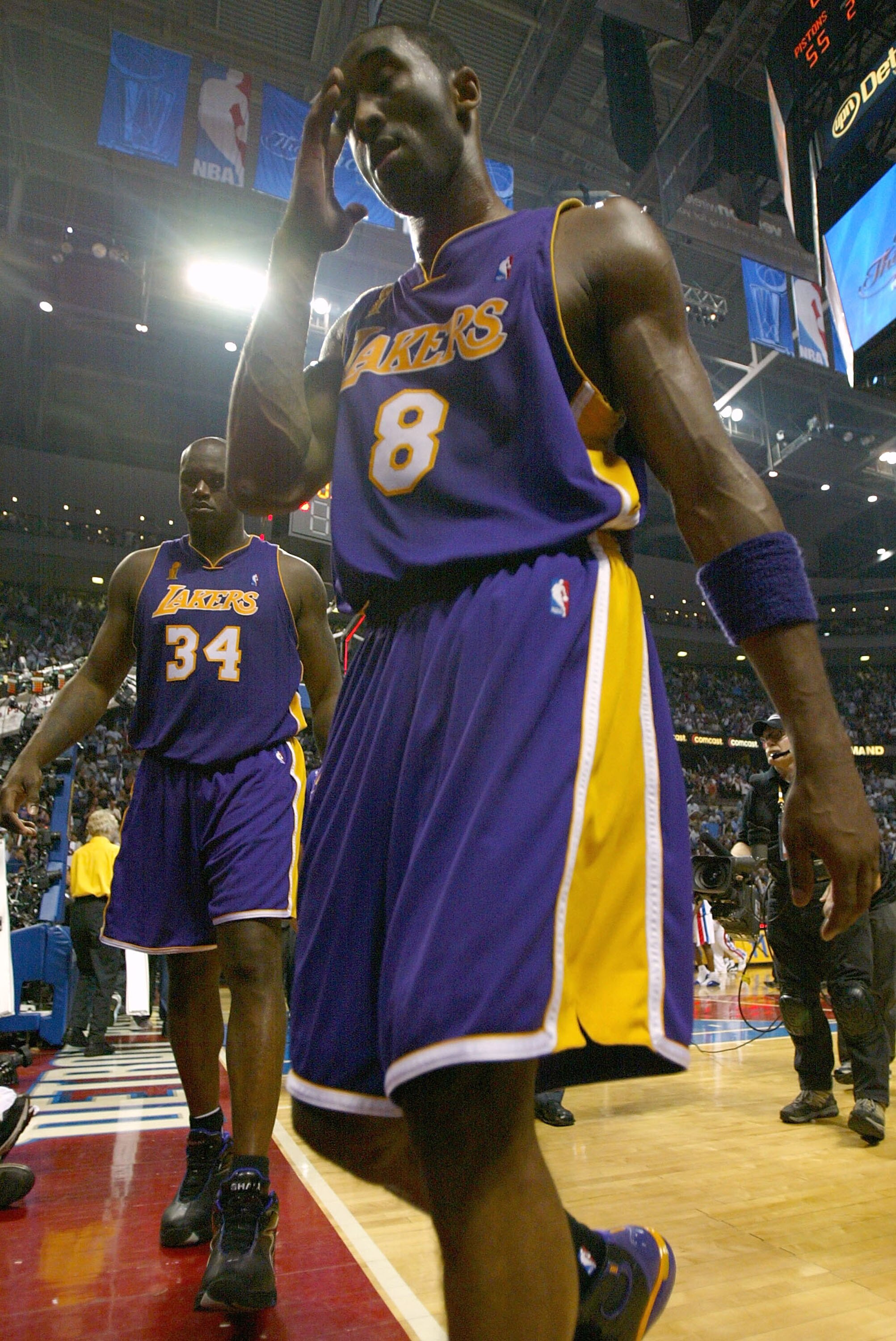 AUBURN HILLS, MI - JUNE 15: (L-R) Shaquille O'Neal #34 and Kobe Bryant #8 of the Los Angeles Lakers walks off the court at halftime of game five of the 2004 NBA Finals against the Detroit Pistons on June 15, 2004 at The Palace of Auburn Hills in Auburn Hi
