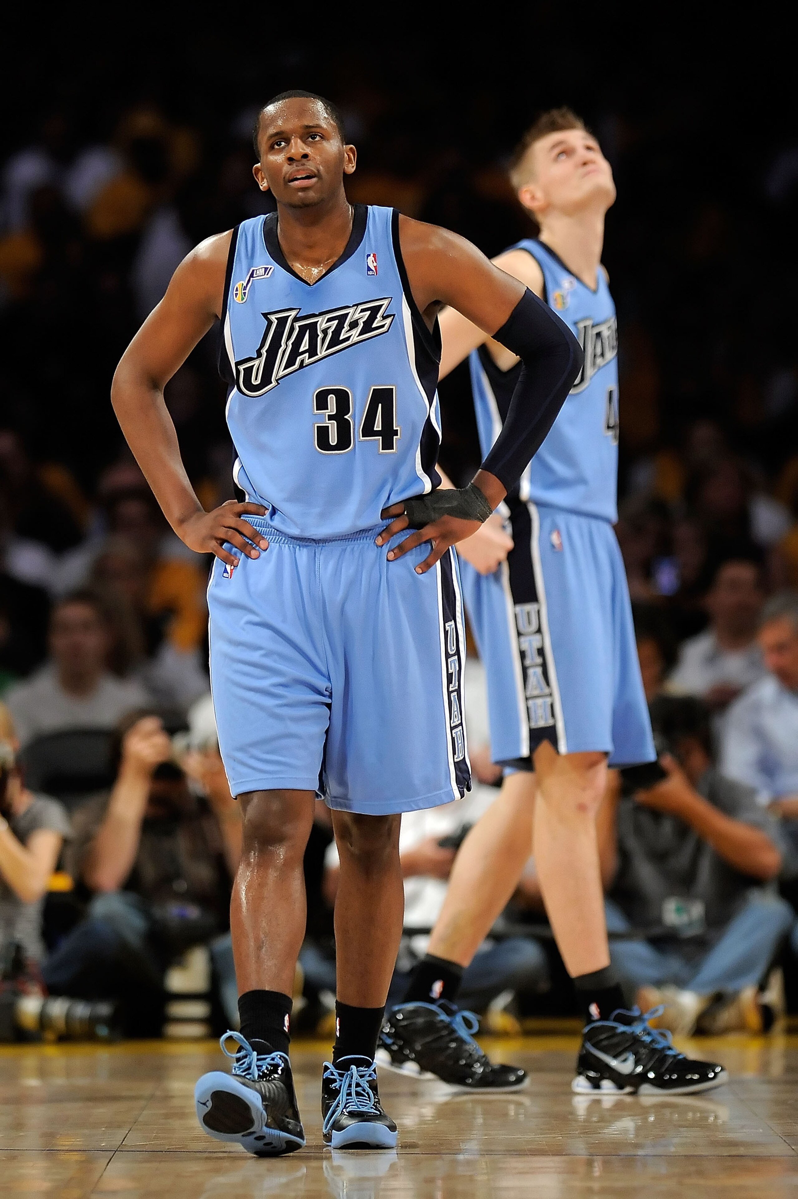 LOS ANGELES, CA - APRIL 19:  (L-R) C.J. Miles #34 and Andrei Kirilenko #47 of the Utah Jazz react in the second quarter against the Los Angeles Lakers in Game One of the Western Conference Quarterfinals during the 2009 NBA Playoffs at Staples Center on Ap