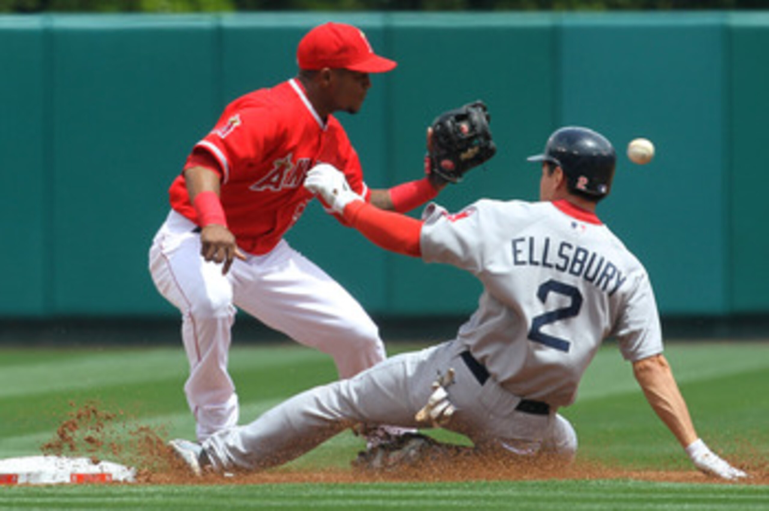 ANAHEIM, CA - APRIL 24:  Jacoby Ellsbury #2 of the Boston Red Sox slides into second with a leadoff double as shortstop Erick Aybar #2 of the Los Angeles Angels of Anaheim takes the throw in the first inning on April 24, 2011 at Angel Stadium in Anaheim, 