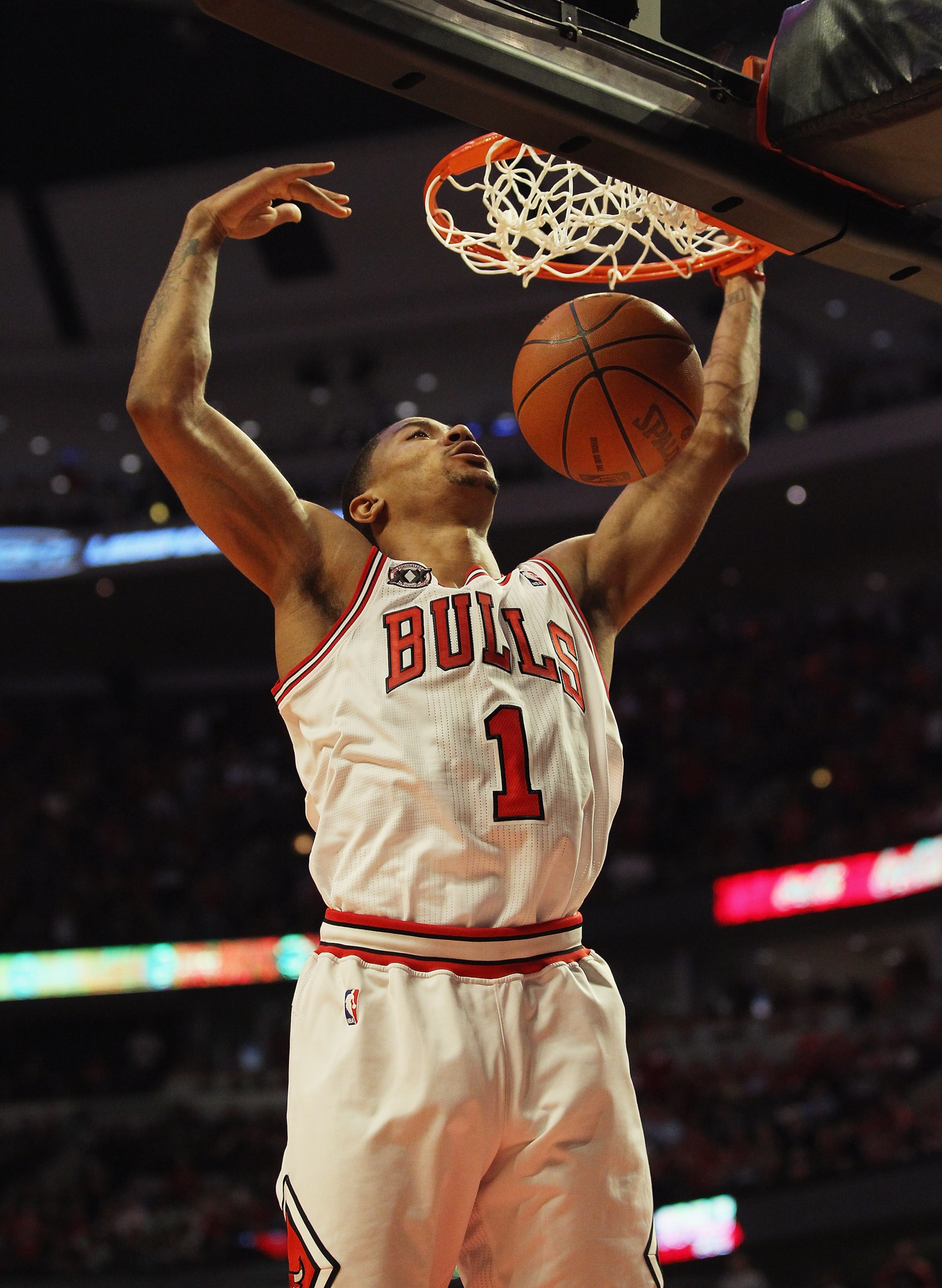 CHICAGO, IL - MAY 02: Derrick Rose #1 of the Chicago Bulls dunks the ball against the Atlanta Hawks in Game One of the Eastern Conference Semifinals in the 2011 NBA Playoffs at the United Center on May 2, 2011 in Chicago, Illinois. The Hawks defeated the