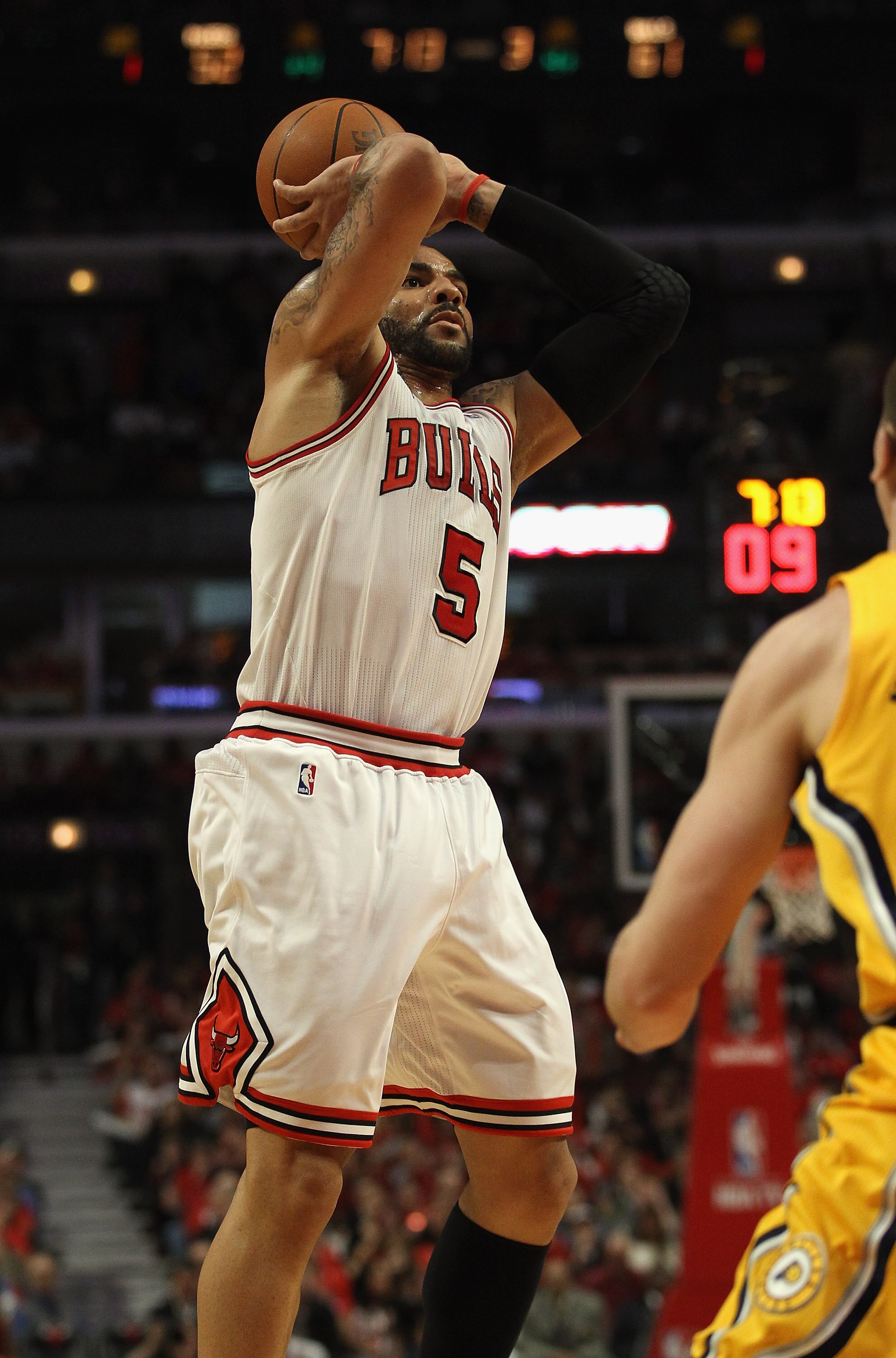 CHICAGO, IL - APRIL 26: Carlos Boozer #5 of the Chicago Bulls takes a shot against the Indiana Pacers in Game Five of the Eastern Conference Quarterfinals in the 2011 NBA Playoffs at the United Center on April 26, 2011 in Chicago, Illinois. The Bulls defe