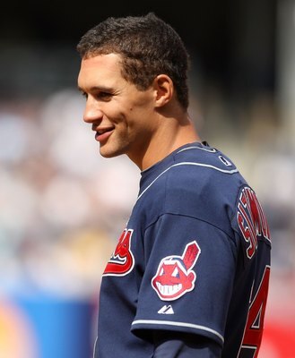 NEW YORK - APRIL 19:  Grady Sizemore #24 of the Cleveland Indians stands on first base after getting a hit during their game against the New York Yankees at Yankee Stadium on April 19, 2009 in the Bronx borough of New York City.  (Photo by Ezra Shaw/Getty