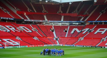 MANCHESTER, ENGLAND - MAY 03:  The Schalke squad listen to a team talk during a training session ahead of their UEFA Champions League semi final second leg match against Manchester United at Old Trafford on May 3, 2011 in Manchester, England.  (Photo by M