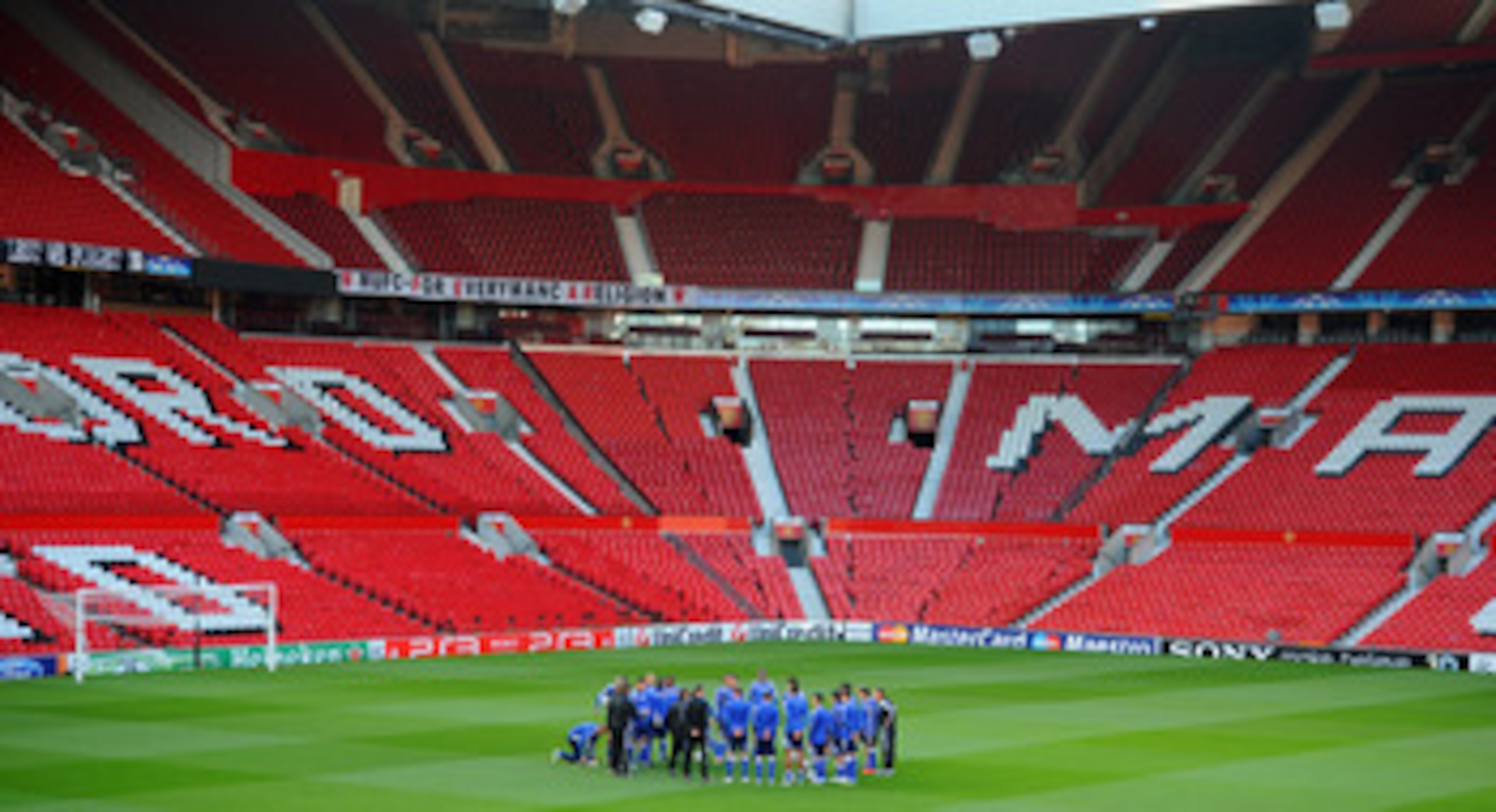 MANCHESTER, ENGLAND - MAY 03:  The Schalke squad listen to a team talk during a training session ahead of their UEFA Champions League semi final second leg match against Manchester United at Old Trafford on May 3, 2011 in Manchester, England.  (Photo by M