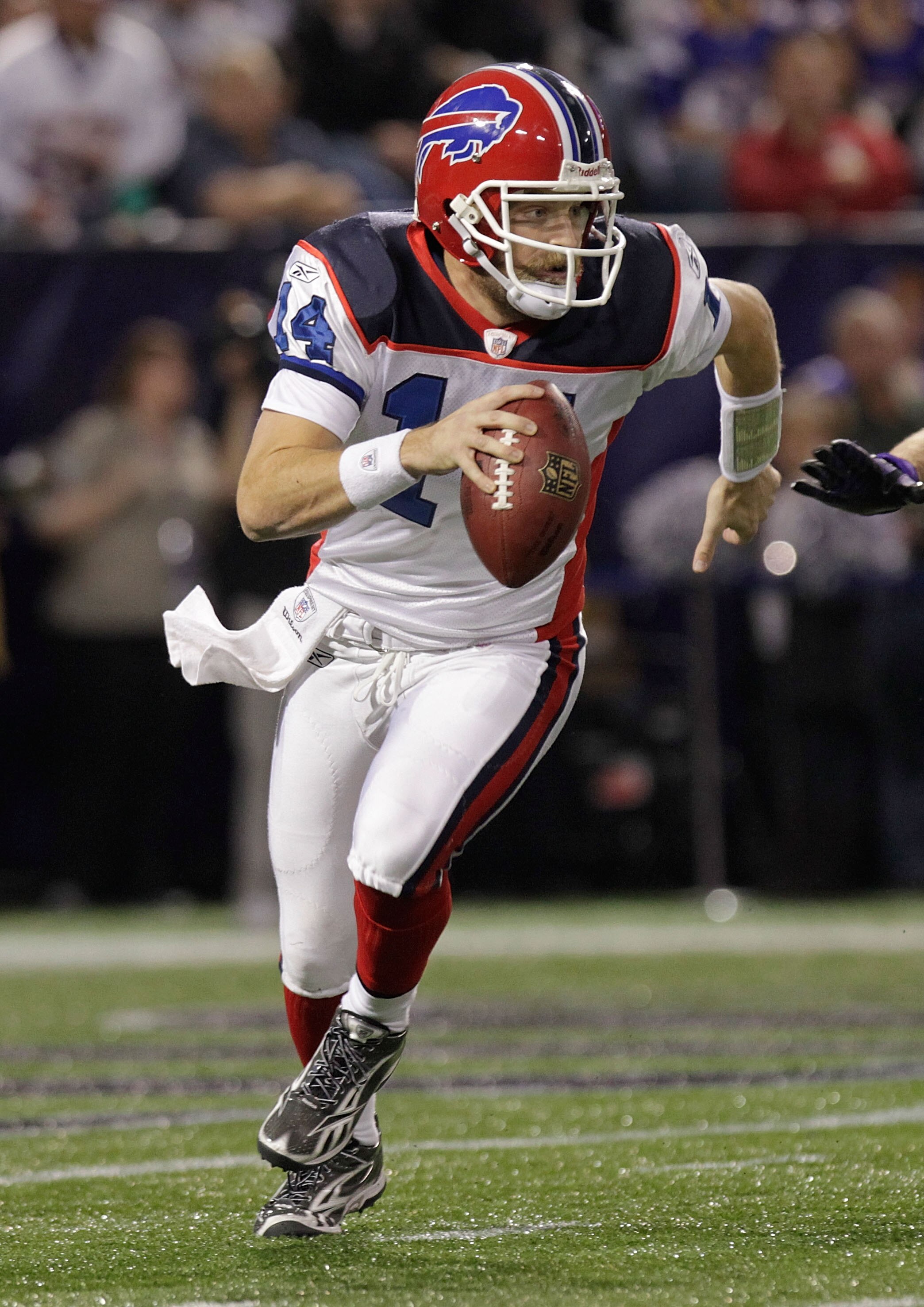 MINNEAPOLIS, MN - DECEMBER 05:  Ryan Fitzpatrick #14 of the Buffalo Bills rolls out against the Minnesota Vikings at the Mall of America Field at the Hubert H. Humphrey Metrodome on December 5, 2010 in Minneapolis, Minnesota.  (Photo by Nick Laham/Getty I
