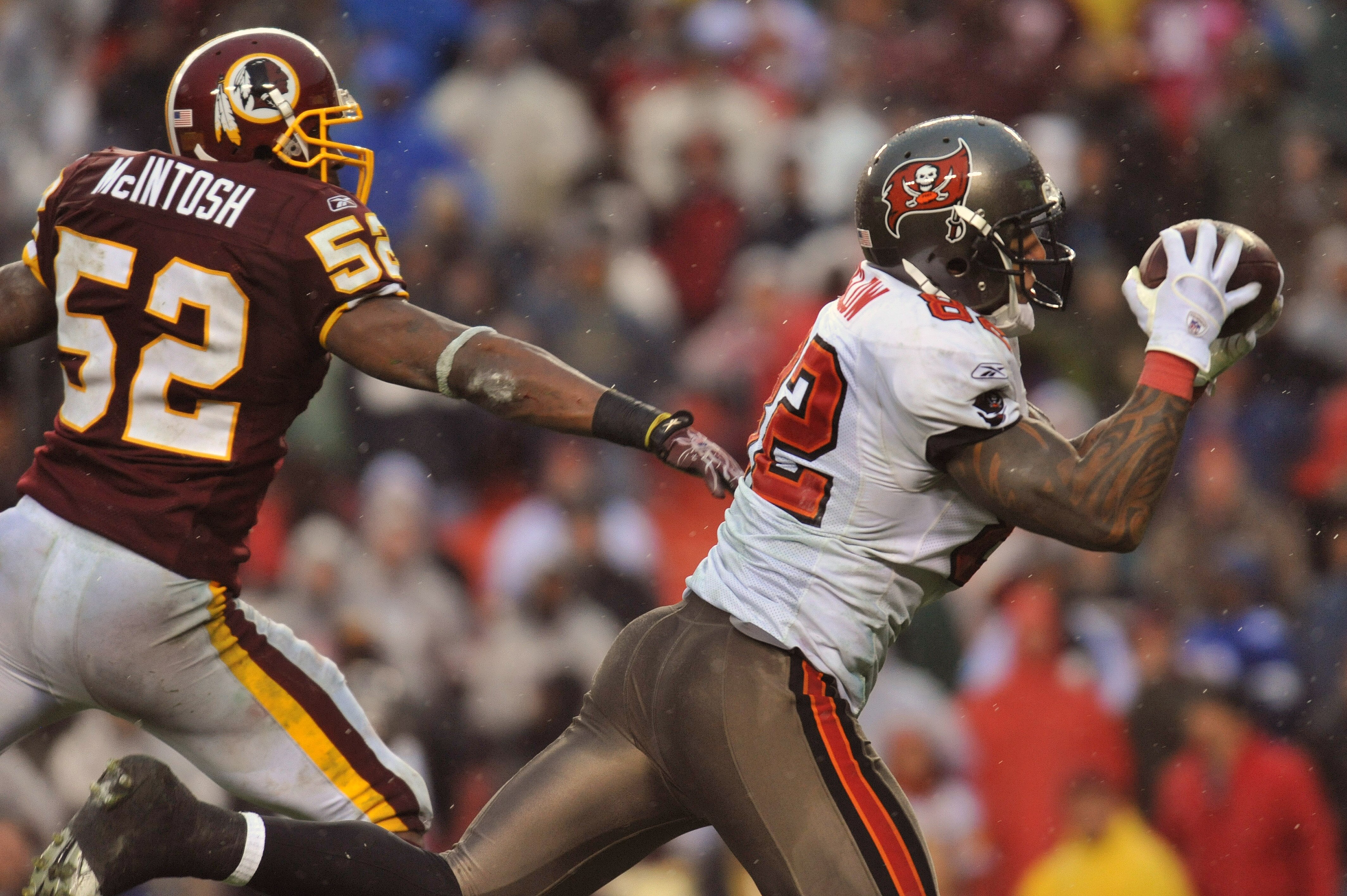 LANDOVER, MD - DECEMBER 12:  Kellen Winslow #82 of the Tampa Bay Buccaneers makes a catch for a fourth quarter touchdown against the Washington Redskins  at FedExField on December 12, 2010 in Landover, Maryland. The Buccaneers defeated the Redskins 17-16.