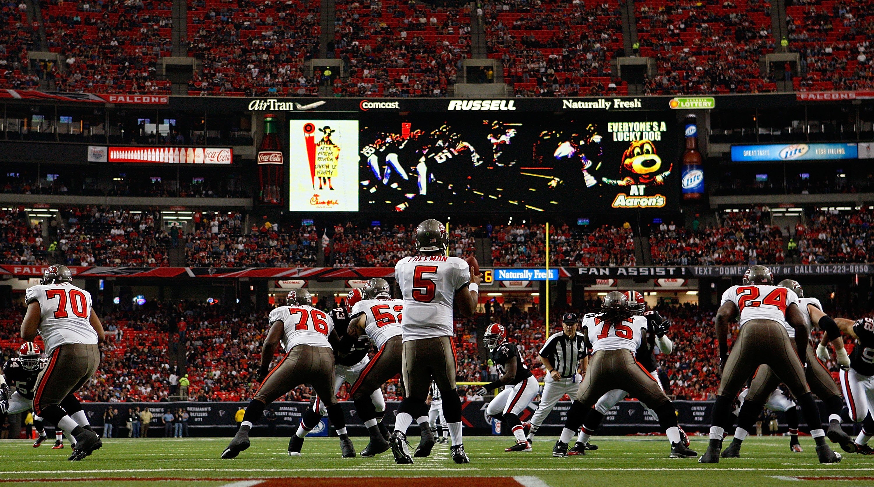 ATLANTA - NOVEMBER 29:  The Tampa Bay Buccaneers offense runs a play against the Atlanta Falcons defense at Georgia Dome on November 29, 2009 in Atlanta, Georgia.  (Photo by Kevin C. Cox/Getty Images)