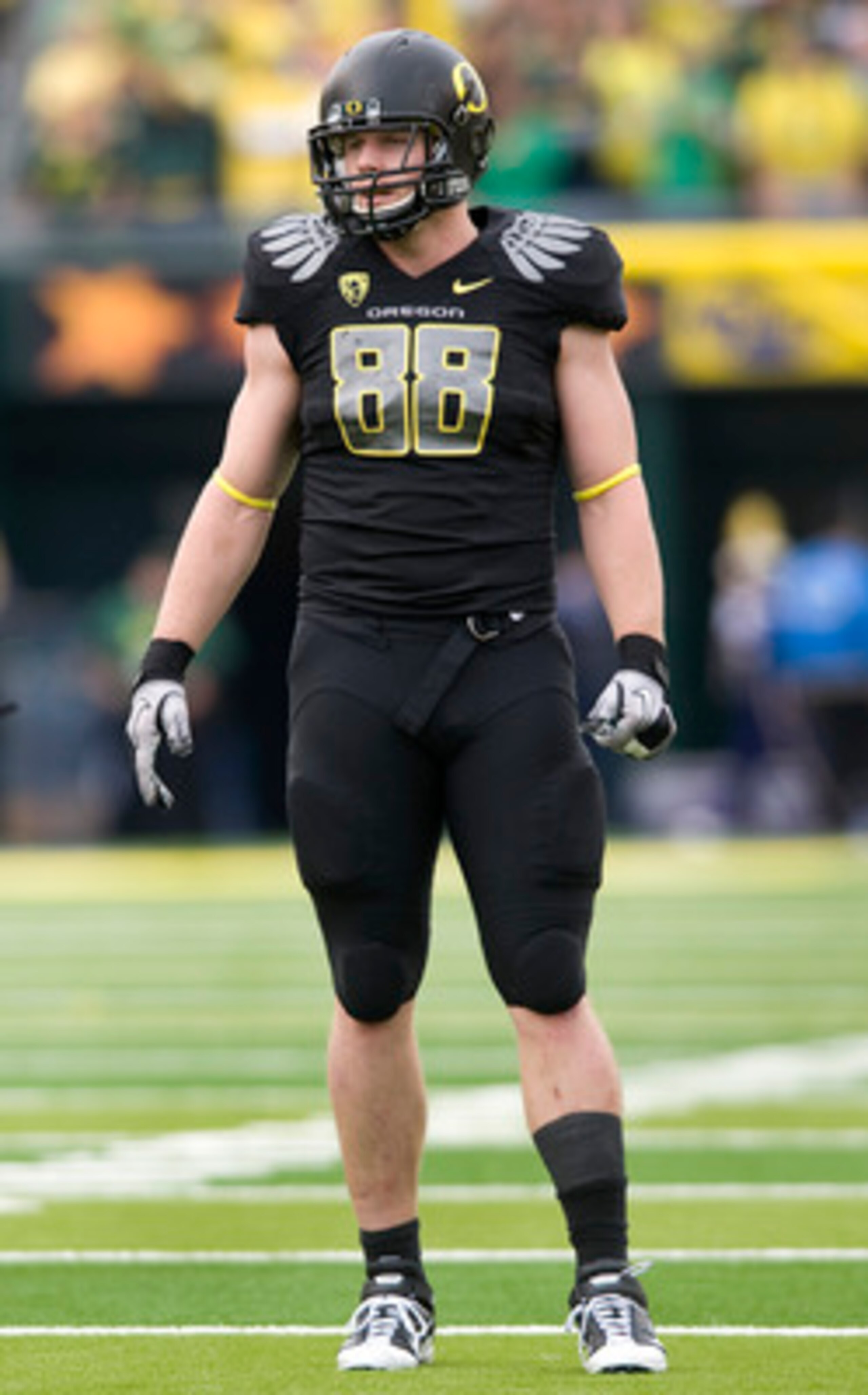 EUGENE, OR - NOVEMBER 6: Defensive end Brandon Bair #88 of the Oregon Ducks looks over the offense as he stands at the line of scrimmage in the third quarter of the game against the Washington Huskies at Autzen Stadium on November 6, 2010 in Eugene, Orego