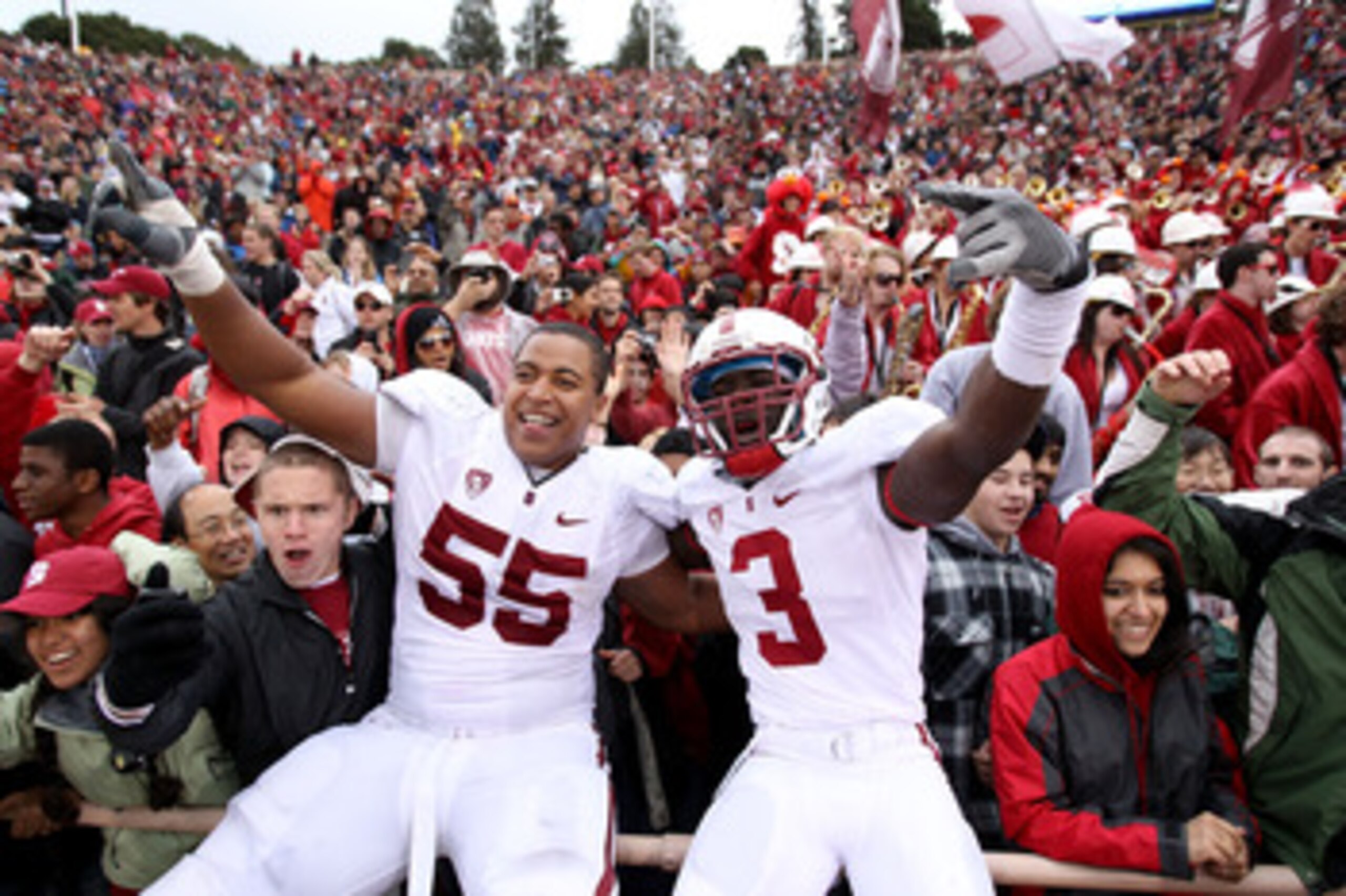 BERKELEY, CA - NOVEMBER 20:  Michael Thomas #3 and Jonathan Martin #55 of the Stanford Cardinal celebrate after beating the California Golden Bears at California Memorial Stadium on November 20, 2010 in Berkeley, California.  (Photo by Ezra Shaw/Getty Ima