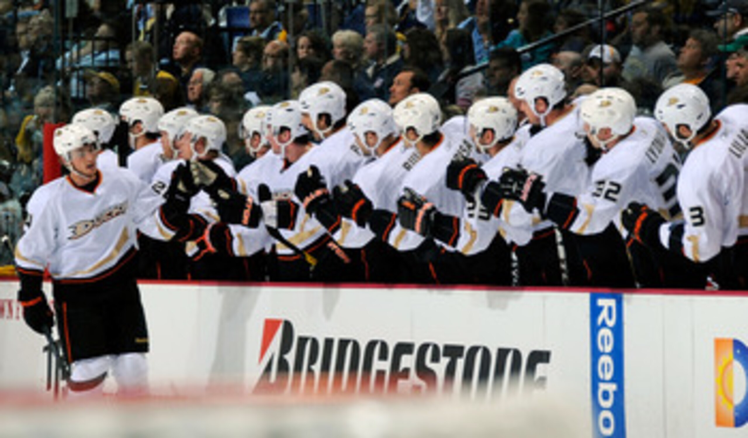 NASHVILLE, TN - APRIL 20:  Cam Fowler #4 of the Anaheim Ducks celebrates a goal with teammates against the Nashville Predators in Game Four of the Western Conference Quarterfinals during the 2011 NHL Stanley Cup Playoffs at Bridgestone Arena on April 20, 