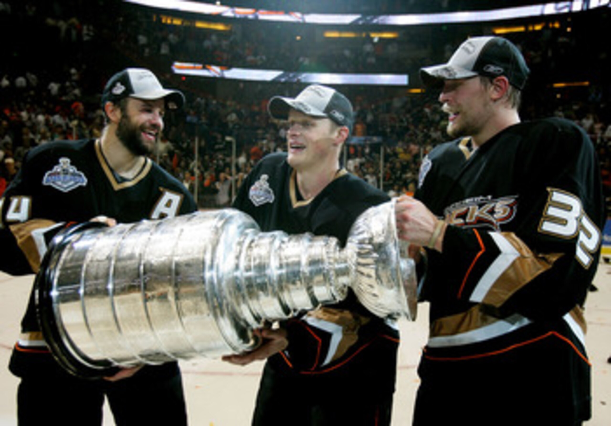 ANAHEIM, CA - JUNE 06:  (L-R) Rob Niedermayer #44, Samuel Pahlsson #26 and Travis Moen #32 of the Anaheim Ducks celebrate winning the Stanley Cup after defeating the Ottawa Senators in Game Five of the 2007 Stanley Cup finals on June 6, 2007 at Honda Cent