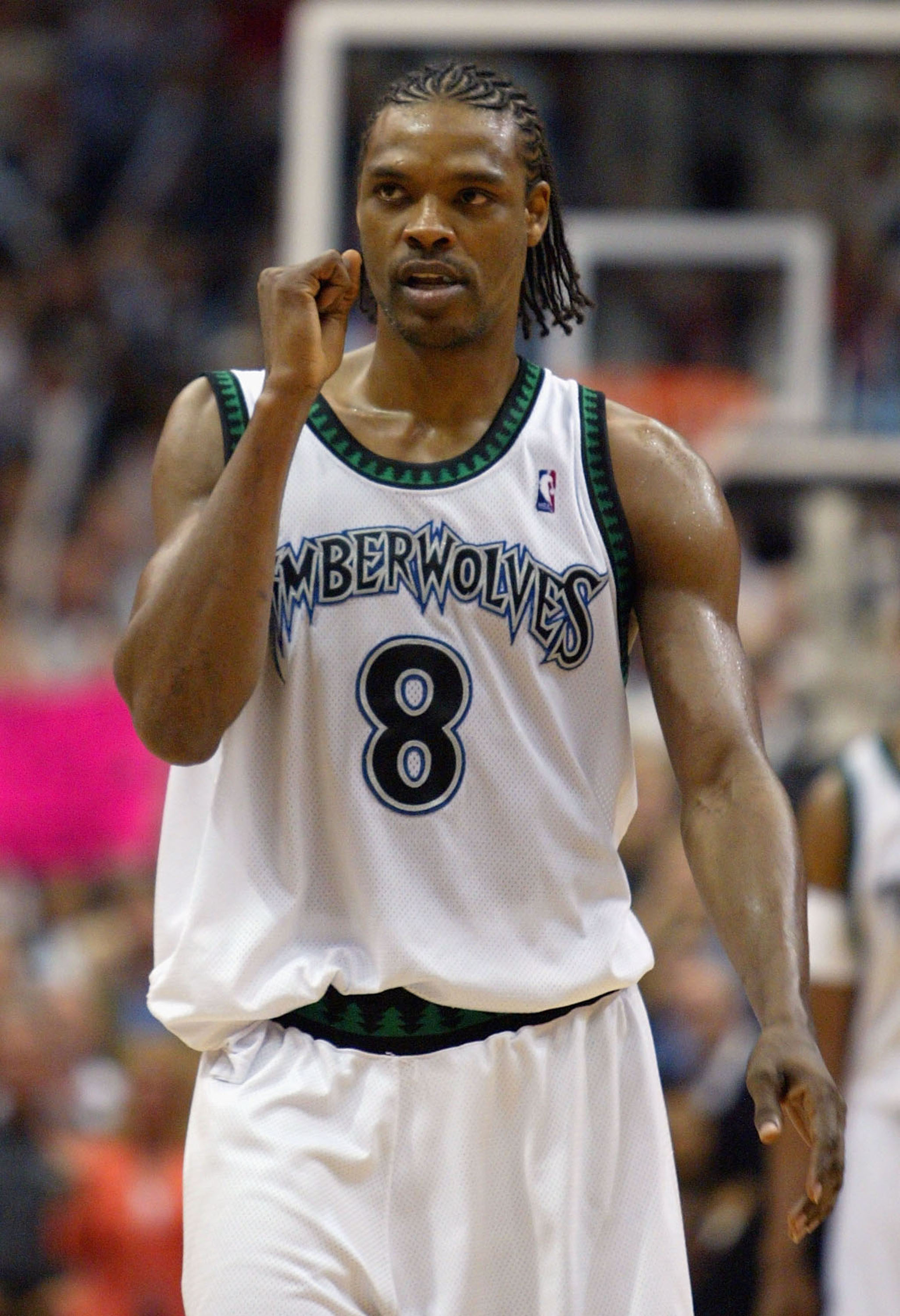 MINNEAPOLIS - MAY 19: Latrell Sprewell #8 of the Minnesota Timberwolves celebrates during the second half against the Sacramento Kings in game seven of the NBA Western Conference Semifinals on May 19, 2004 at the Target Center  in Minneapolis, Minnesota.