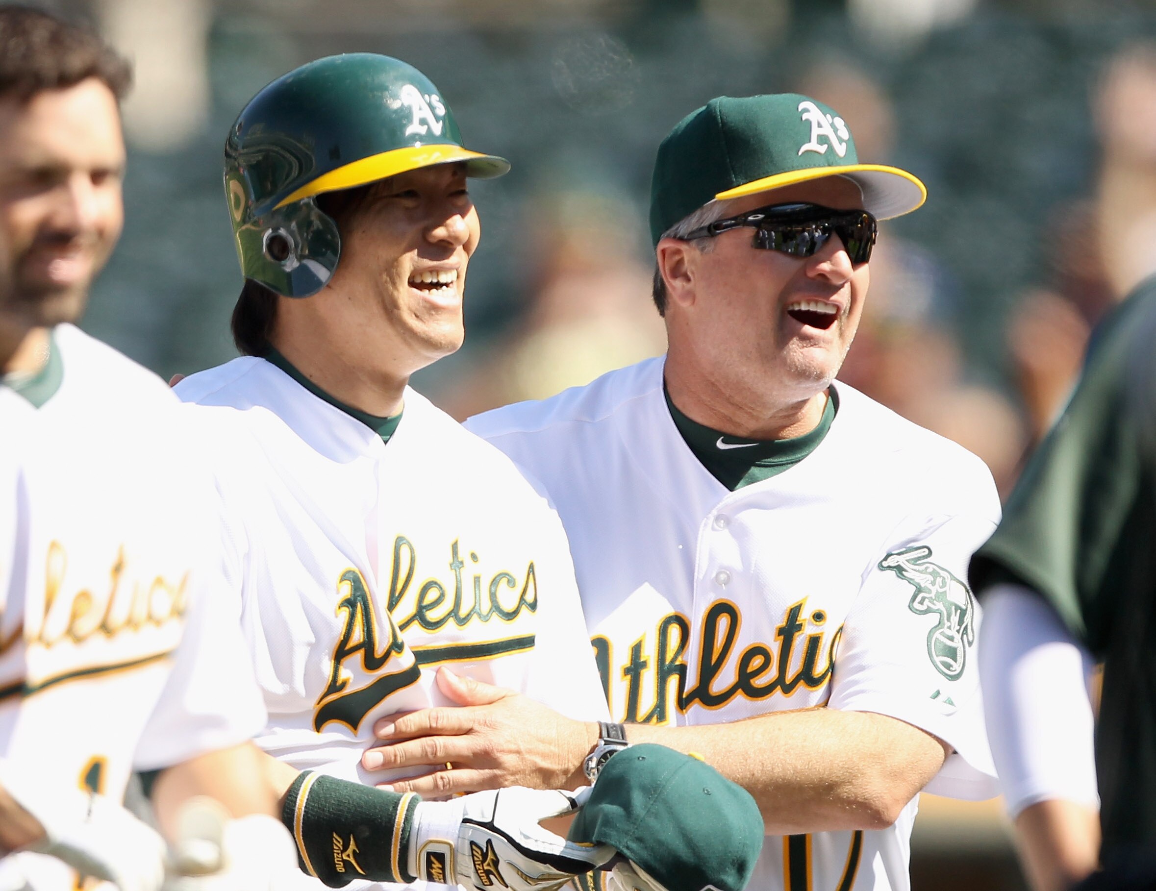 OAKLAND, CA - MAY 02:  Hideki Matsui #55 of the Oakland Athletics is congratulated by manager Bob Geren after he hit a walk off home run to win the game in the tenth inning against the Texas Rangers at Oakland-Alameda County Coliseum on May 2, 2011 in Oak