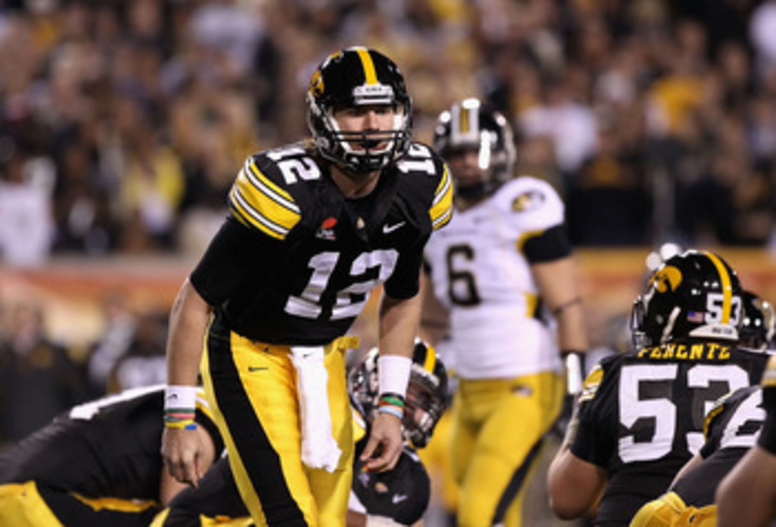TEMPE, AZ - DECEMBER 28:  Quarterback Ricky Stanzi #12 of the Iowa Hawkeyes during the Insight Bowl against the Missouri Tigers at Sun Devil Stadium on December 28, 2010 in Tempe, Arizona. The Hawkeyes defeated the Tigers 27-24.  (Photo by Christian Peter