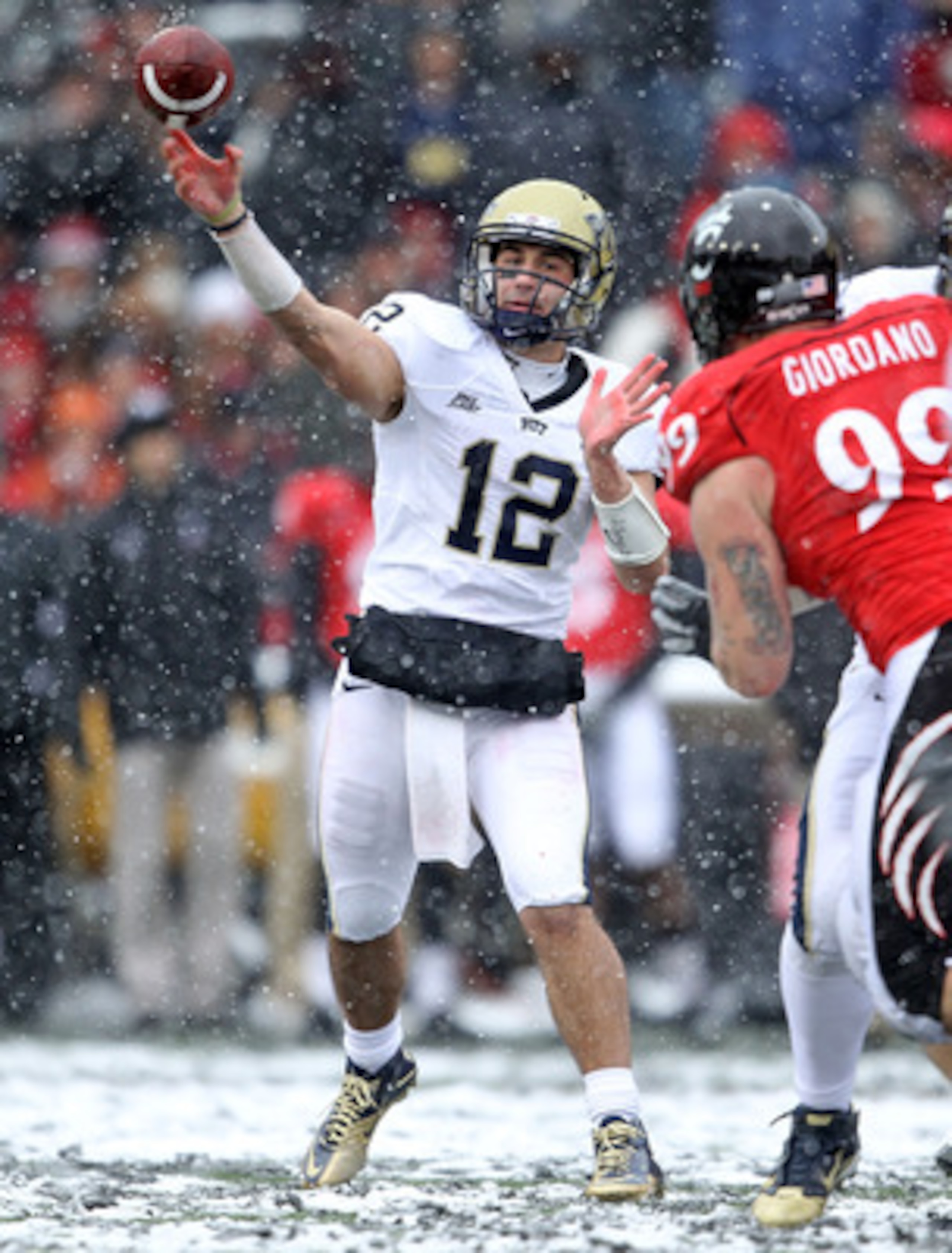 CINCINNATI, OH - DECEMBER 04: Tino Sunseri #12 of the Pittsburgh Panthers throws the ball during the Big East Conference game against the Cincinnati Bearcats at Nippert Stadium on December 4, 2010 in Cincinnati, Ohio.  Pittsburgh won 28-10.  (Photo by And
