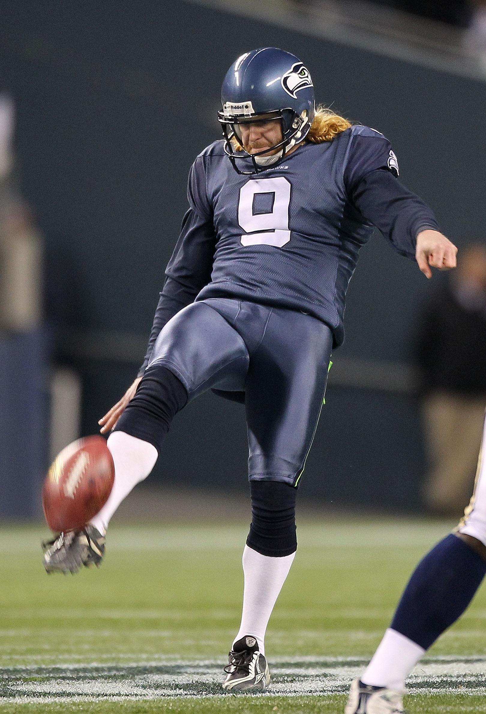 SEATTLE, WA - JANUARY 02:  Punter Jon Ryan #9 of the Seattle Seahawks kicks the ball against the St. Louis Rams during their game at Qwest Field on January 2, 2011 in Seattle, Washington.  (Photo by Otto Greule Jr/Getty Images)