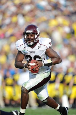 JACKSONVILLE, FL - JANUARY 01:  Quarterback Chris Relf #36 of the Mississippi State Bulldogs rushes against the Michigan Wolverines during the Gator Bowl at EverBank Field on January 1, 2011 in Jacksonville, Florida  (Photo by Rick Dole/Getty Images)