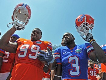 GAINESVILLE, FL - APRIL 9:  Running back Chris Rainey #3 and nose tackle Omar Hunter #99 of the Florida Gators celebrates after the Orange and Blue spring football game April 9, 2010 Ben Hill Griffin Stadium at Gainesville, Florida.  (Photo by Al Messersc