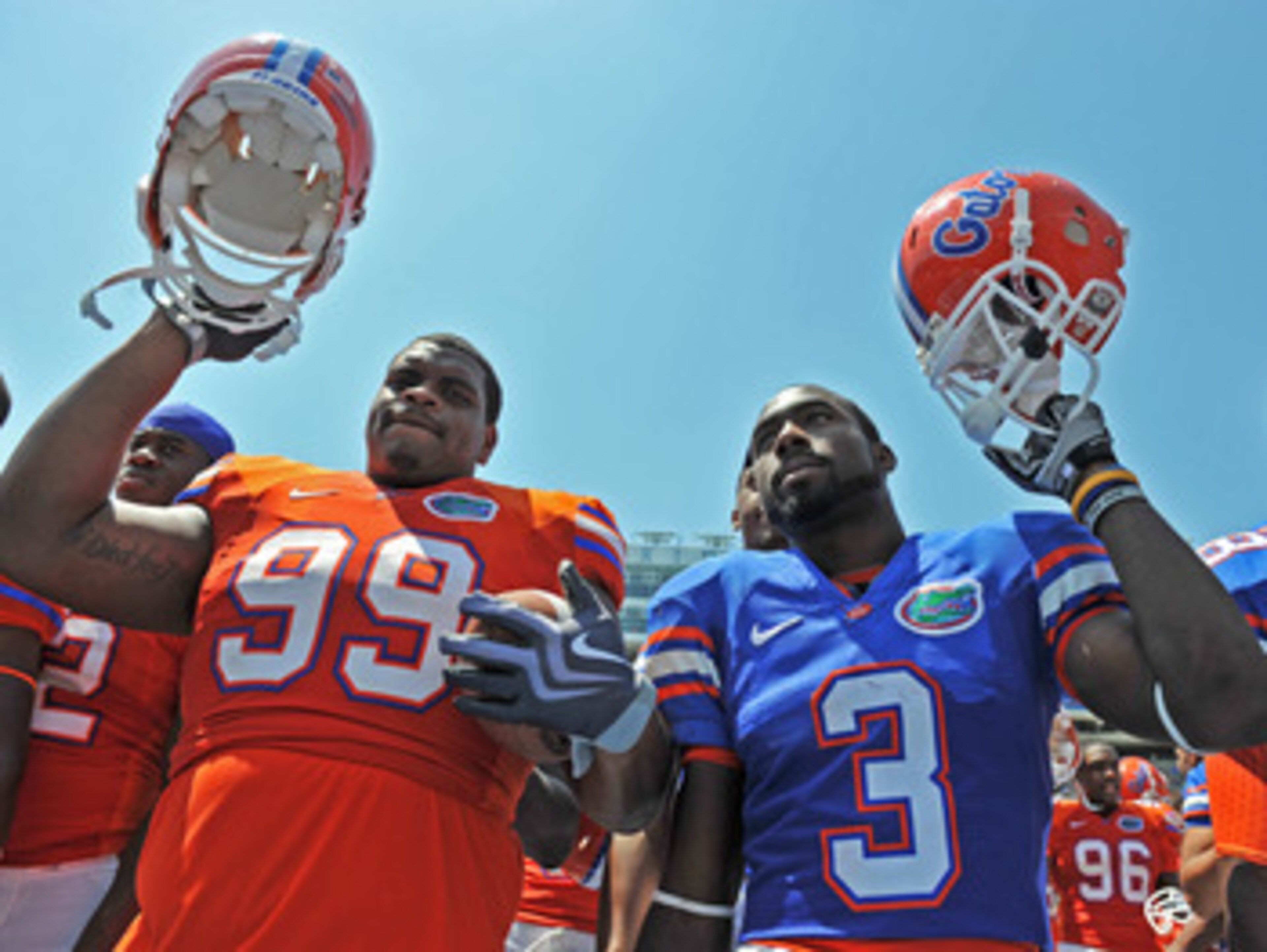 GAINESVILLE, FL - APRIL 9:  Running back Chris Rainey #3 and nose tackle Omar Hunter #99 of the Florida Gators celebrates after the Orange and Blue spring football game April 9, 2010 Ben Hill Griffin Stadium at Gainesville, Florida.  (Photo by Al Messersc
