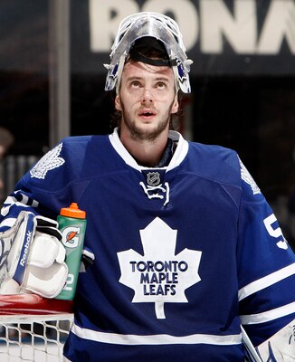 TORONTO, CANADA - JANUARY 6: Jonas Gustavsson #50 of the Toronto Maple Leafs reacts to the 5th goal scored by the St. Louis Blues during game action at the Air Canada Centre January 6, 2011 in Toronto, Ontario, Canada. (Photo by Abelimages/Getty Images)