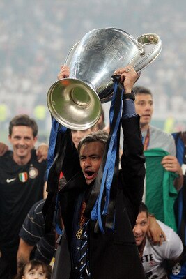 MADRID, SPAIN - MAY 22:  Head coach Jose Mourinho of Inter Milan lifts the UEFA Champions League trophy following their team's victory at the end of the UEFA Champions League Final match between FC Bayern Muenchen and Inter Milan at the Estadio Santiago B