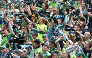 BOSTON - JUNE 13:  Fans of the Los Angeles Lakers cheer during Game Five of the 2010 NBA Finals against the Boston Celtics on June 13, 2010 at TD Garden in Boston, Massachusetts. NOTE TO USER: User expressly acknowledges and agrees that, by downloading an