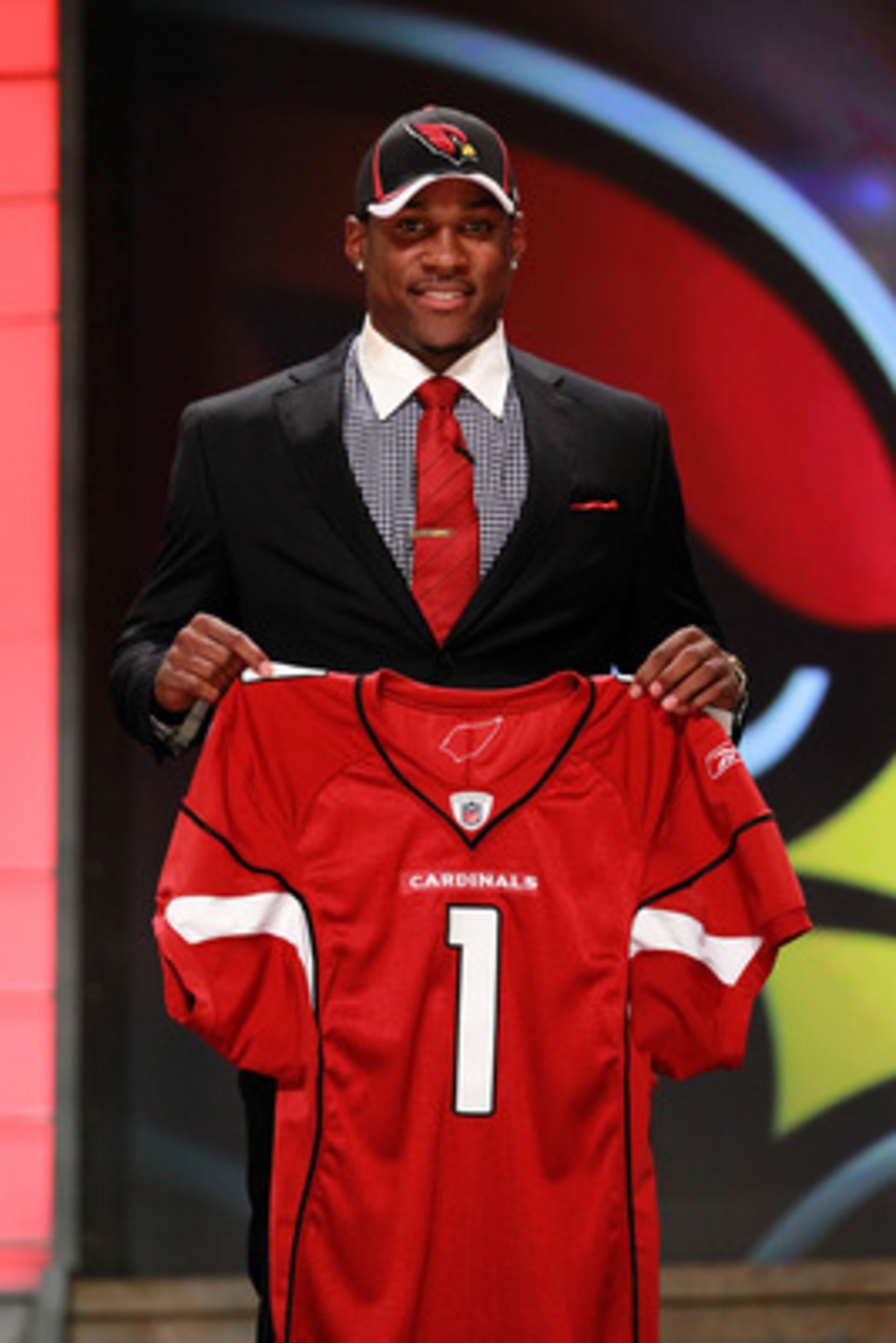 NEW YORK, NY - APRIL 28:  Patrick Peterson, #5 overall pick by the Arizona Cardinals, holds up his jersey on stage during the 2011 NFL Draft at Radio City Music Hall on April 28, 2011 in New York City.  (Photo by Chris Trotman/Getty Images)