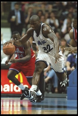 16 Apr 1996:  Center Shaquille O'Neal of the Orlando Magic moves the ball against the Washington Bullets during a game played at the Orlando Arena in Orlando, Florida.  The Magic won the game, 113-95. Mandatory Credit: ALLSPORT USA  /Allsport