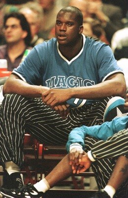 13 DEC 1995:  ORLANDO SHAQUILLE O''NEAL WATCHES FROM THE SIDELINE DURING FIRST QUARTER OF THE MAGIC'S GAME VERSUS THE CHICAGO BULLS AT THE UNITED CENTER IN CHICAGO, ILLINOIS.  Mandatory Credit: Jonathan Daniel/ALLSPORT
